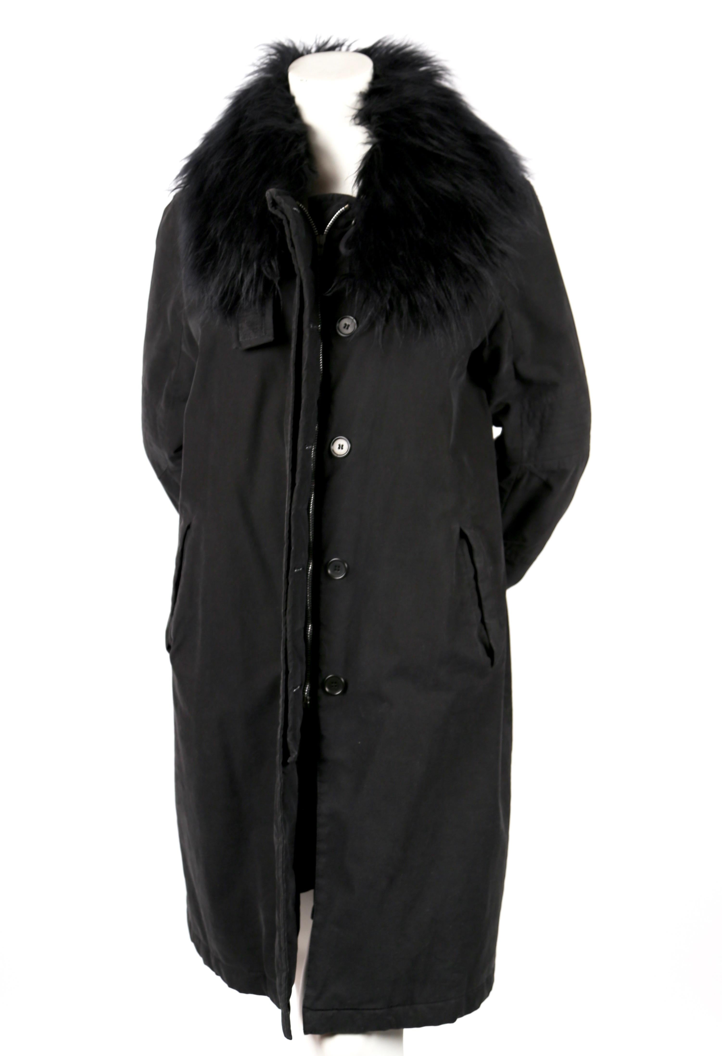 Vintage-black, cotton 'astro' biker coat with faux fur collar and shoulder and leg bondage straps designed by Helmut Lang as seen on the fall 1999 runway. Italian size 40. Approximate measurements: shoulder 16.5