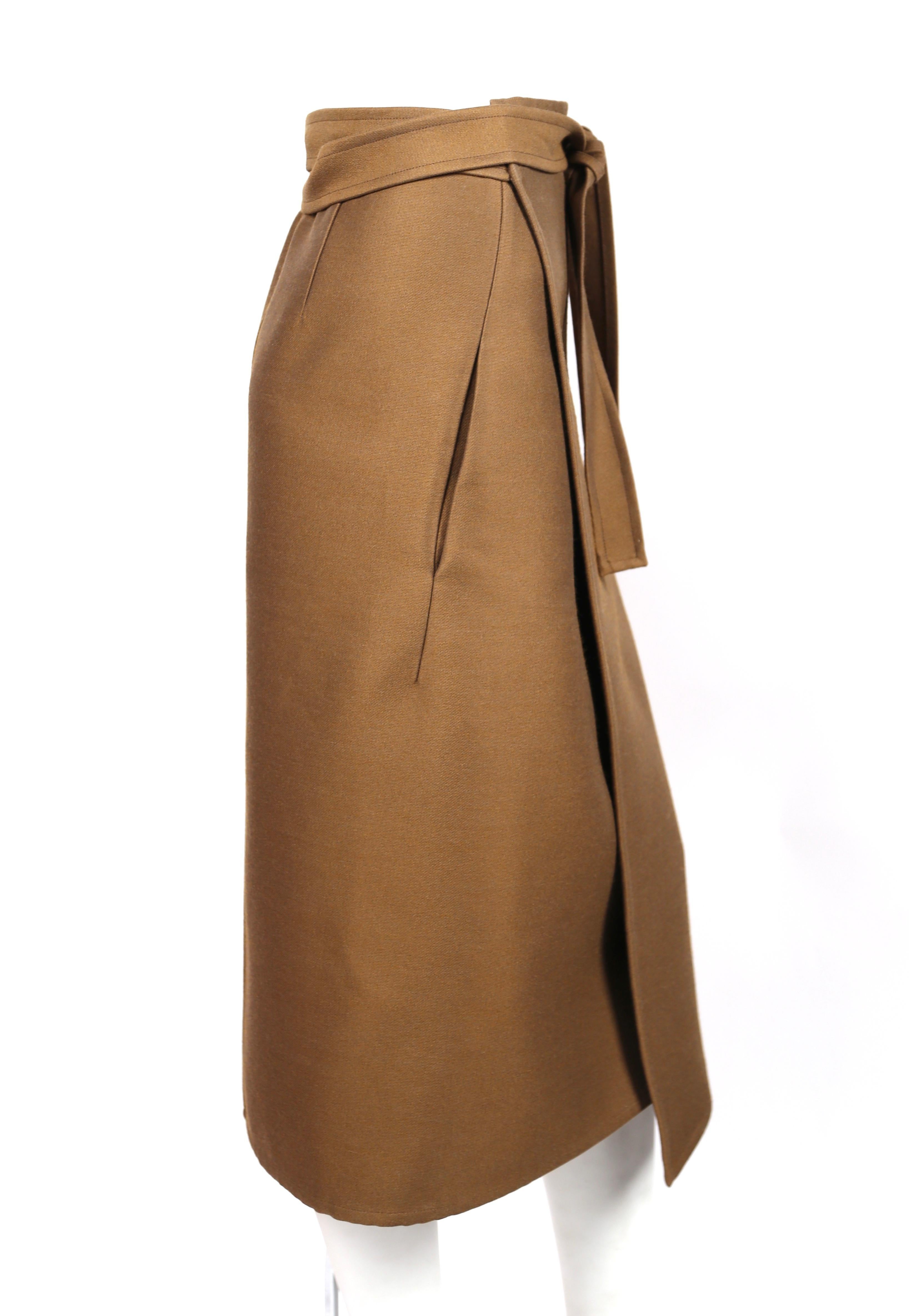 Tan, wool wrap skirt designed by Phoebe Philo for Celine. French size 38. Approximate measurements: 30