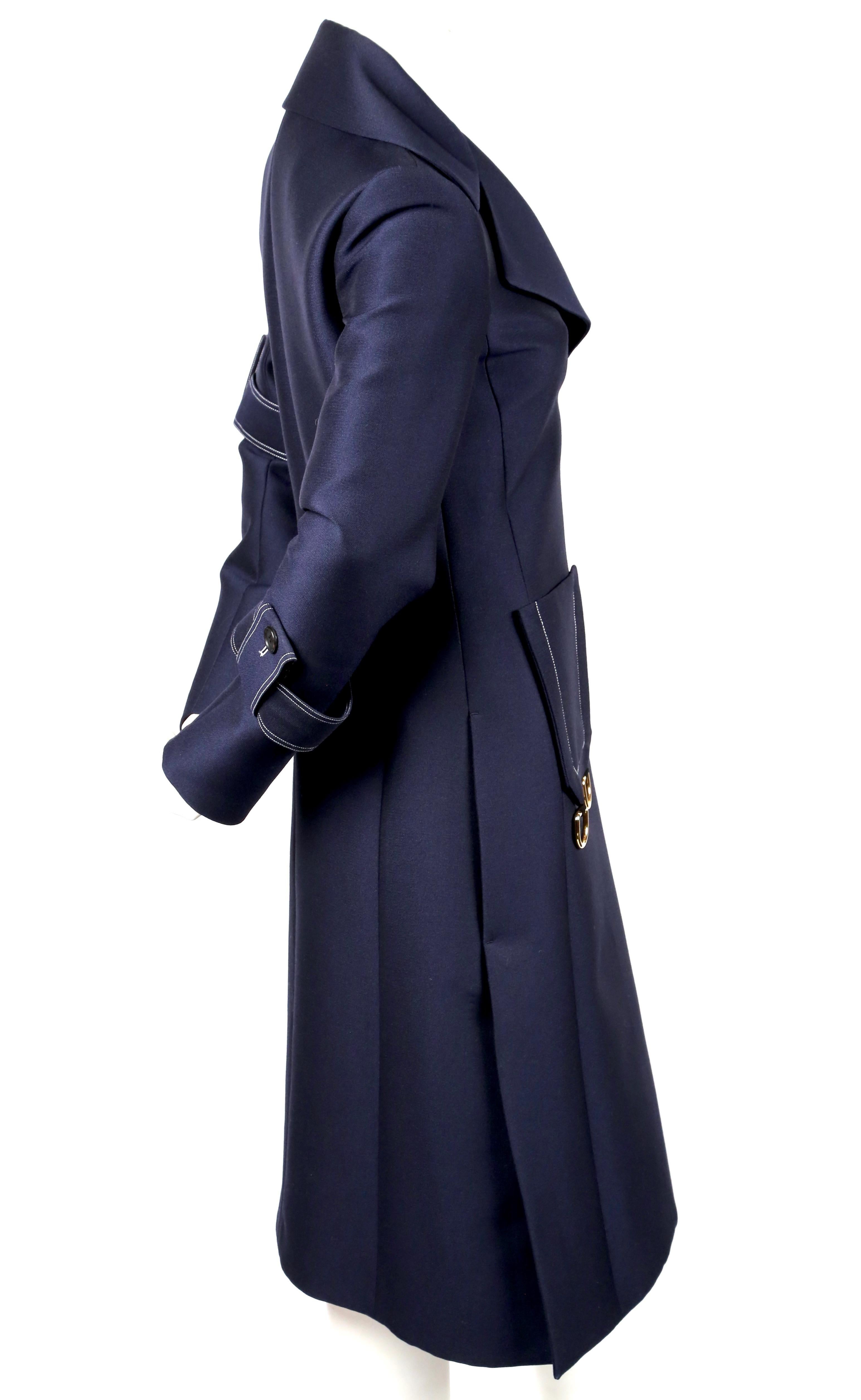 Navy blue, tailored coat with white top-stitching and gold hardware designed by Phoebe Philo for Celine exactly as seen on the spring 2015 runway.  French size 38. Runs small through the bust. Approximate measurements: shoulder 16