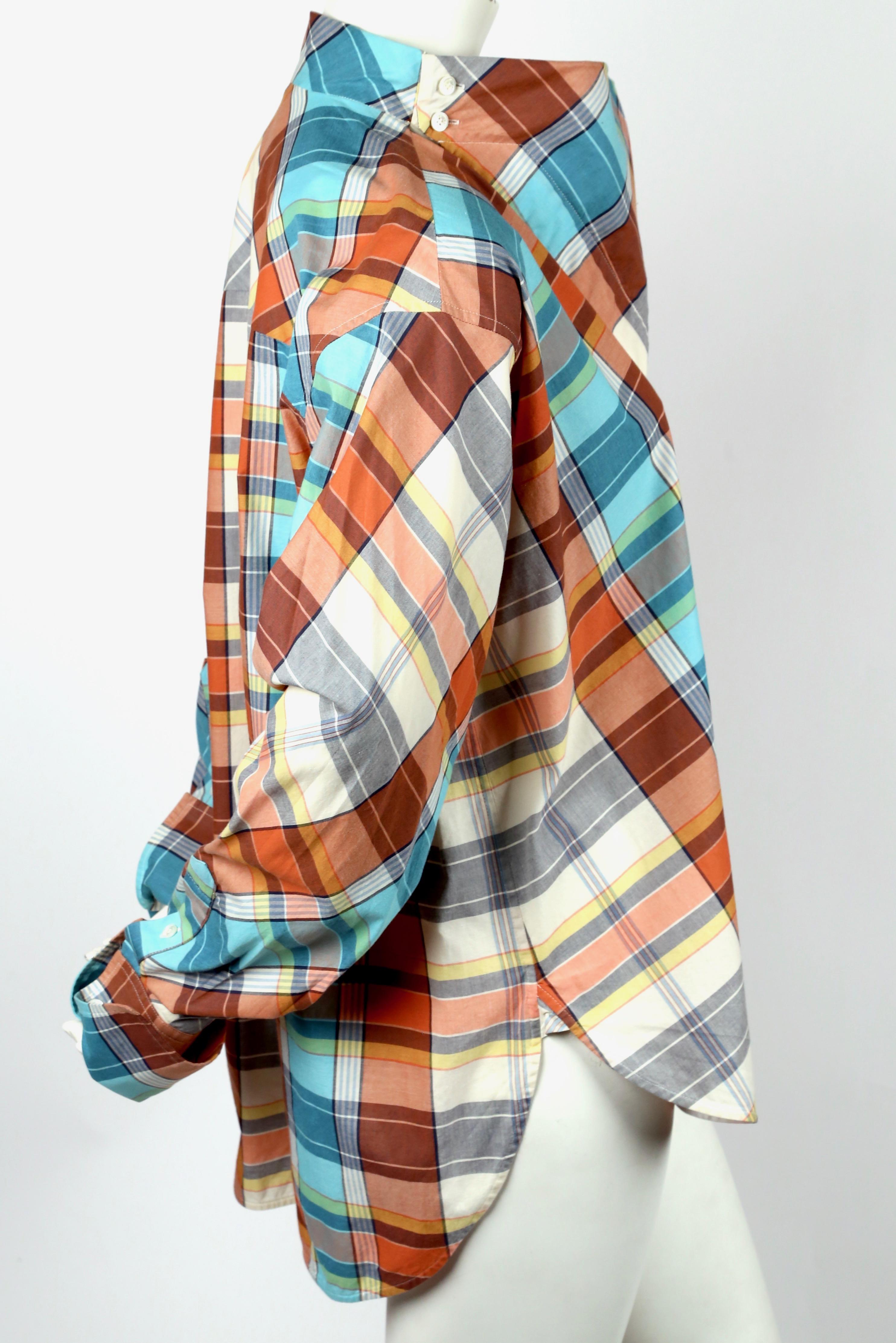 Plaid cotton runway top with draped neckline and French cuffs designed by Phoebe Philo for Celine exactly as seen on the fall 2013 runway. French size 40. Approximate measurements: dropped shoulder 20