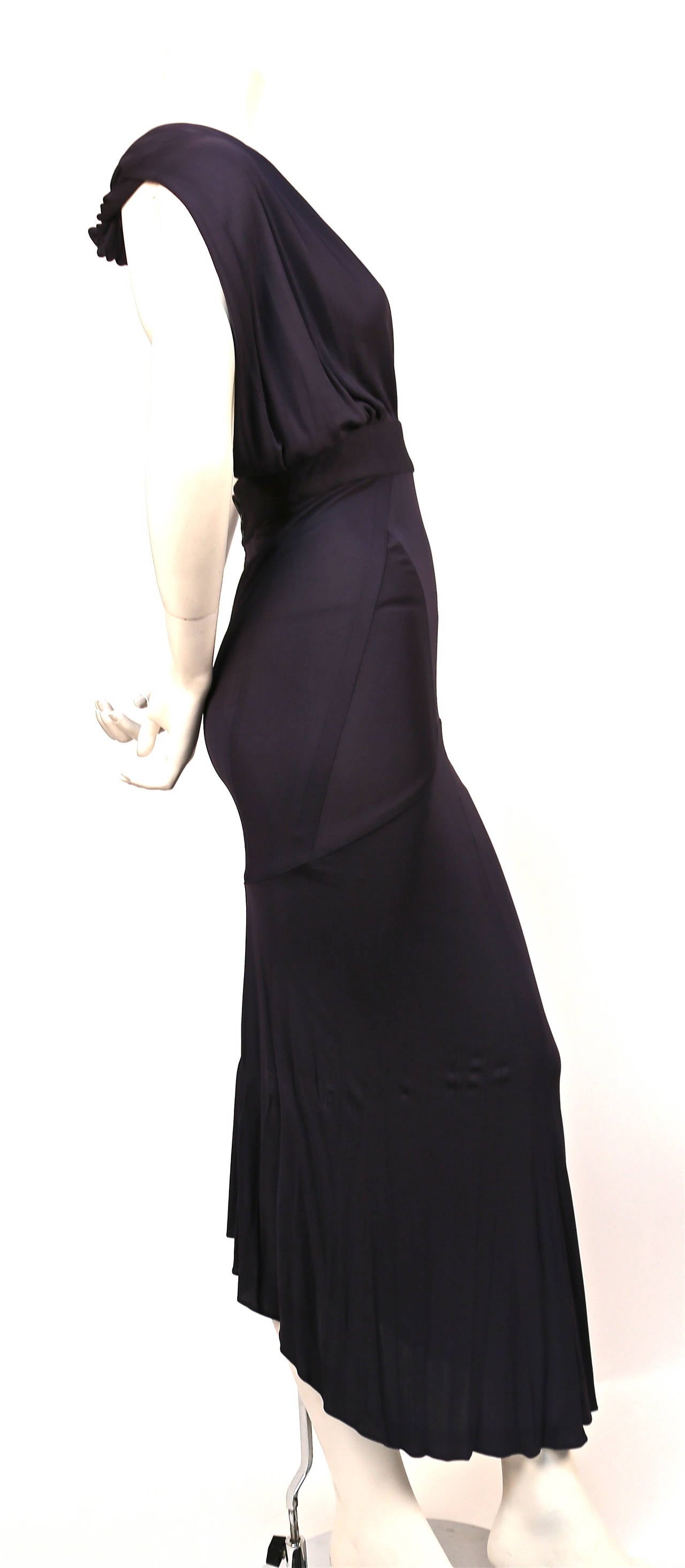 Very rare aubergine seamed dress with crossed halter neck and open back from Azzedine Alaia dating to the early 1990's. Hugs ever contour of the body. Labeled a French size 38 however this best fits a French 36 (25.25