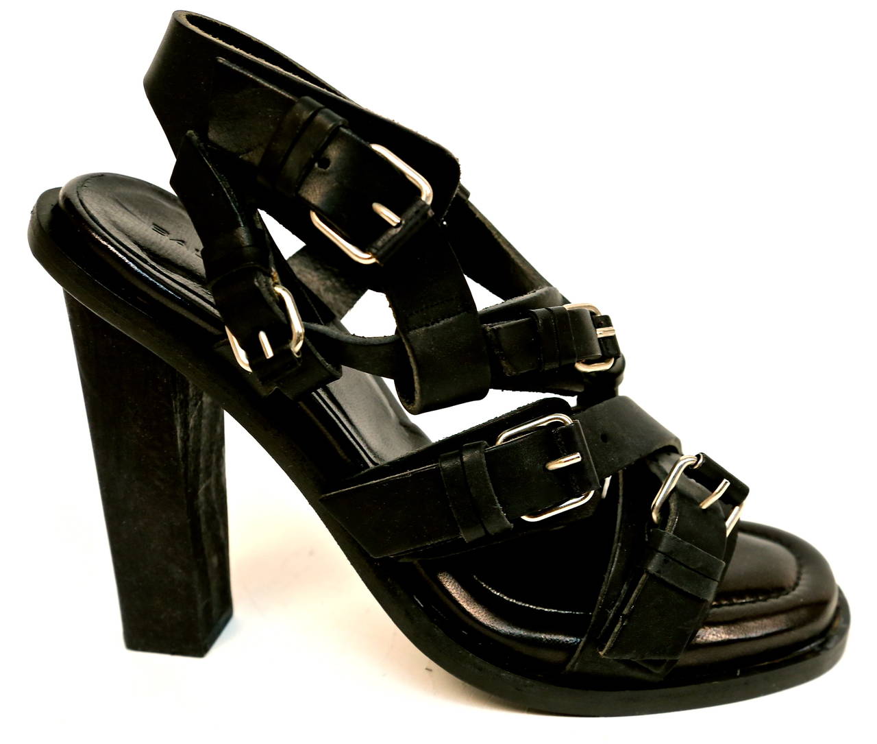 THE sandal featured on every model for spring 2003 Balenciaga show. Very jet black leather sandals with silver buckles and just over 4.75
