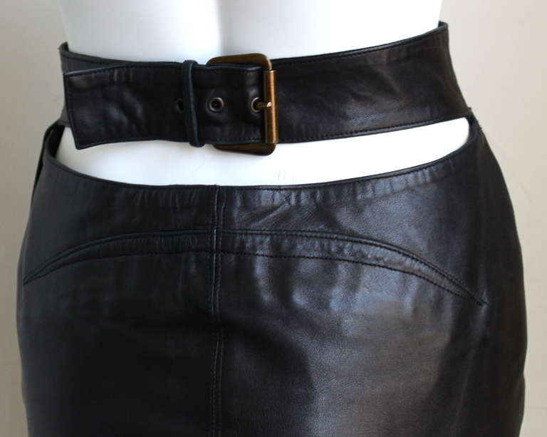 Women's 1990's AZZEDINE ALAIA black high waisted leather skirt with cut out back