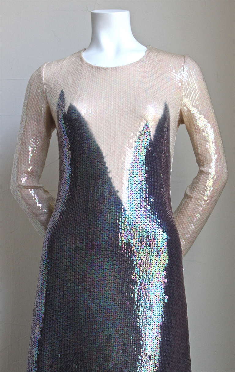 Very rare full length silk jersey sequined gown with geometric motif from Halston dating to ca. 1975. Fits a US 6. Approximate measurements: shoulders 14