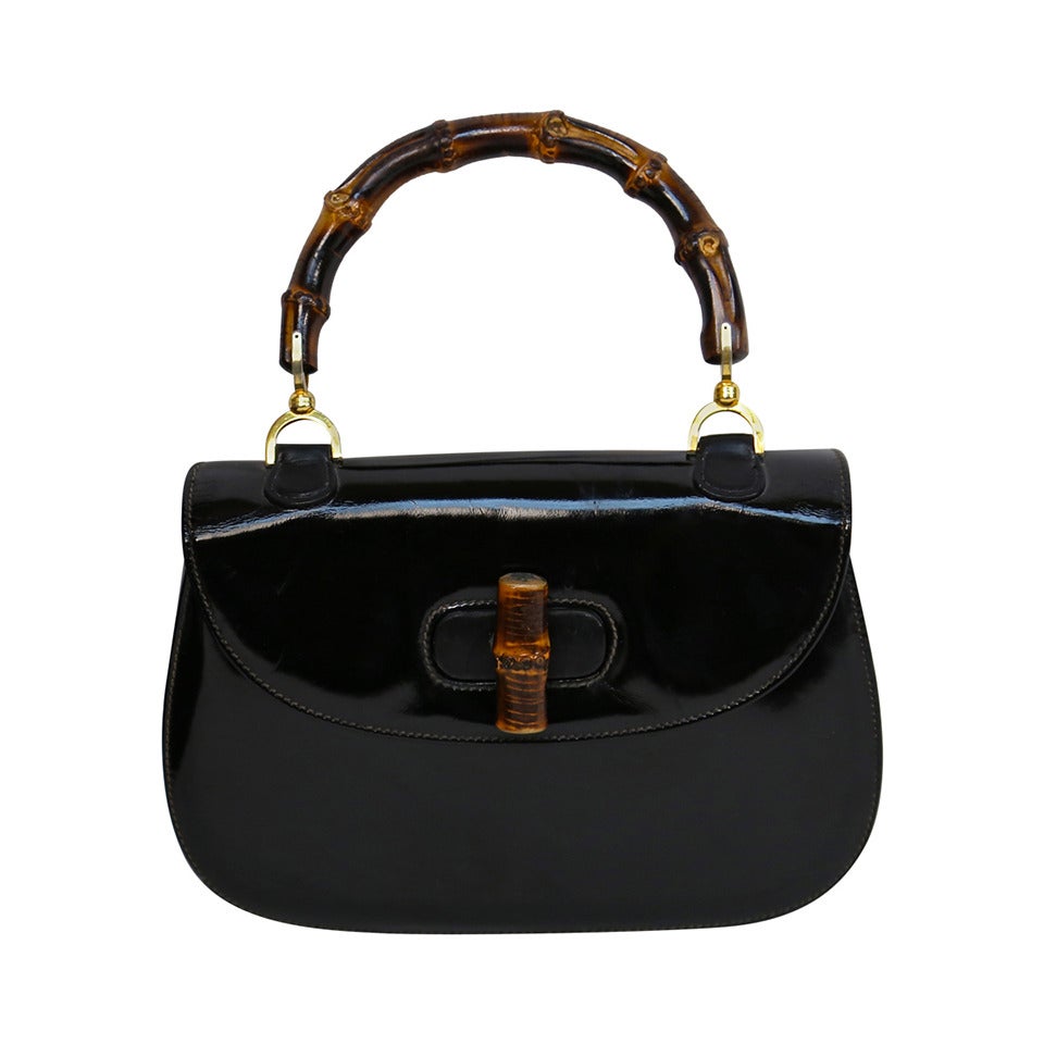 1975 GUCCI black patent leather bag with bamboo handle at 1stdibs