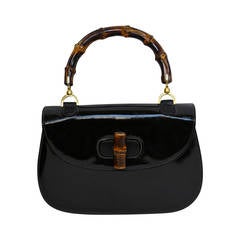 1975 GUCCI black patent leather bag with bamboo handle