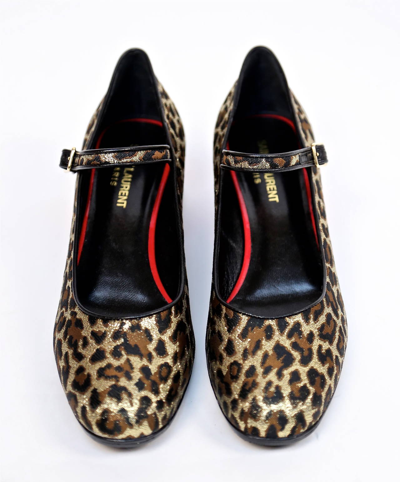 Unworn, metallic woven leopard fabric Mary Janes with leather piping and red patent leather block heel from Saint Laurent. Size 38 (run narrow). Food beds measures approximately: length just under 10