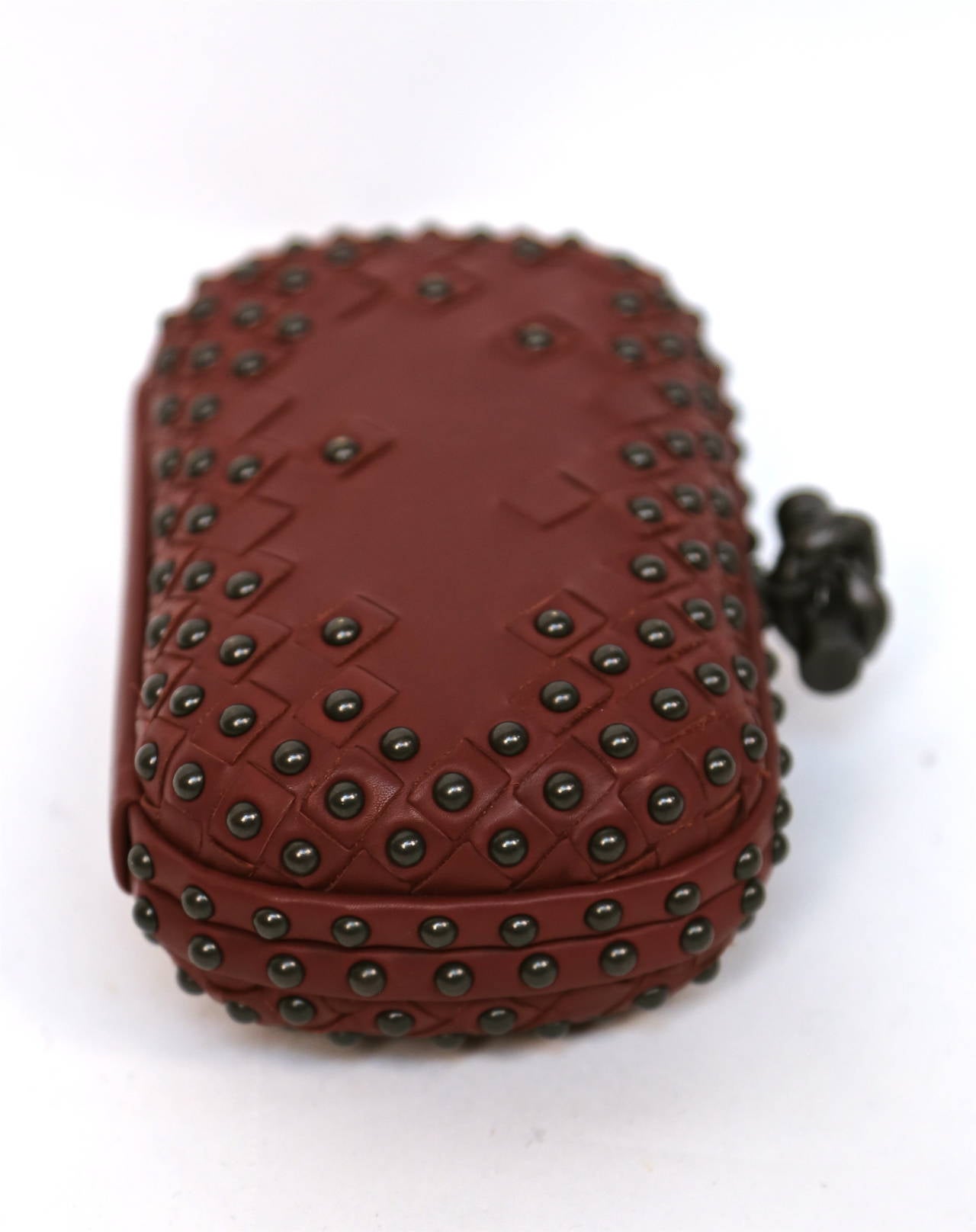 Brown BOTTEGA VENETA gunmetal studded intrecciato leather knot clutch