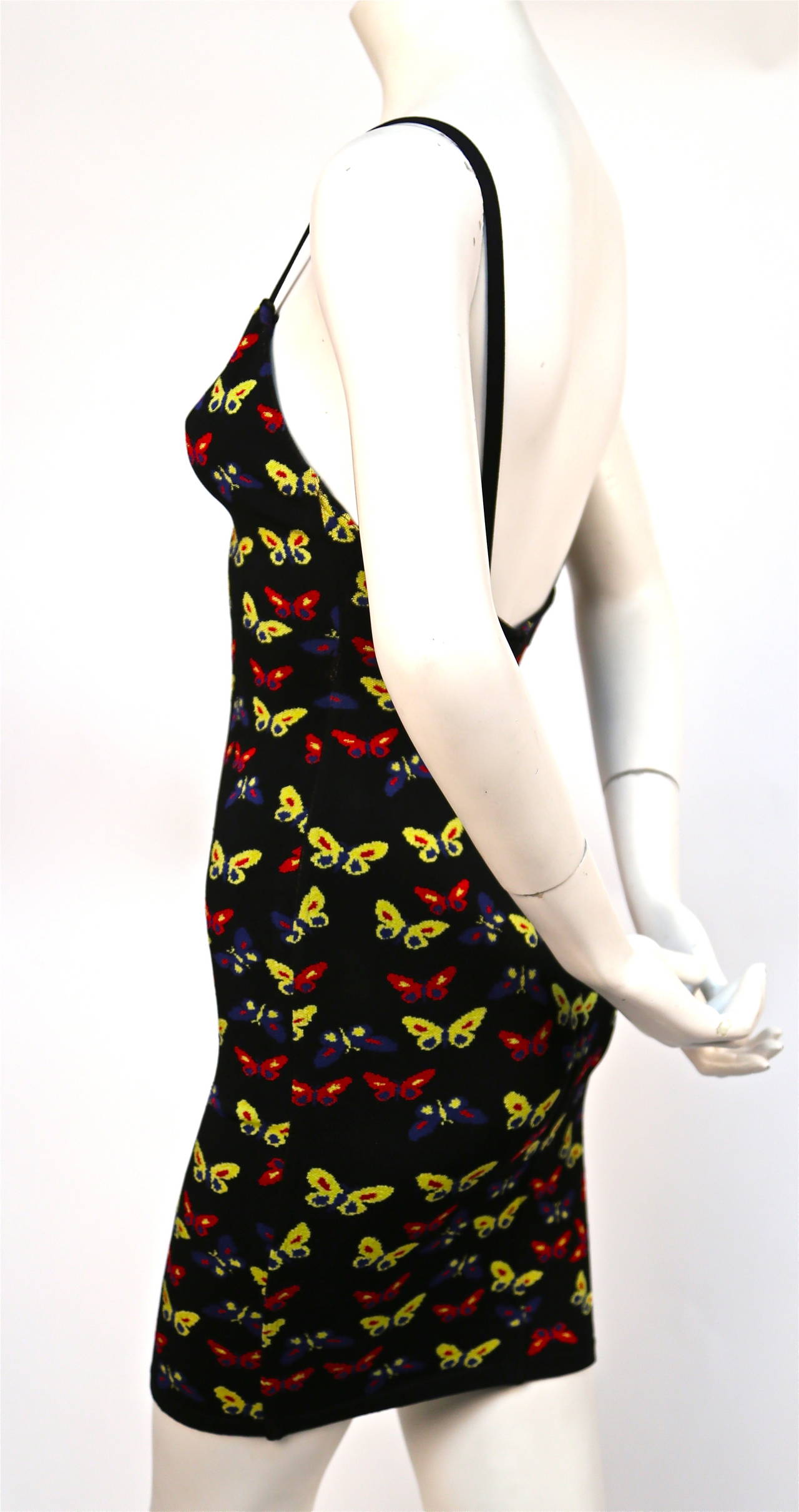 Very rare woven butterfly dress from Azzedine Alaia with artwork designed by Thierry Perez dating to 1992. Labeled a size XS. Approximate un-stretched measurements: bust 25