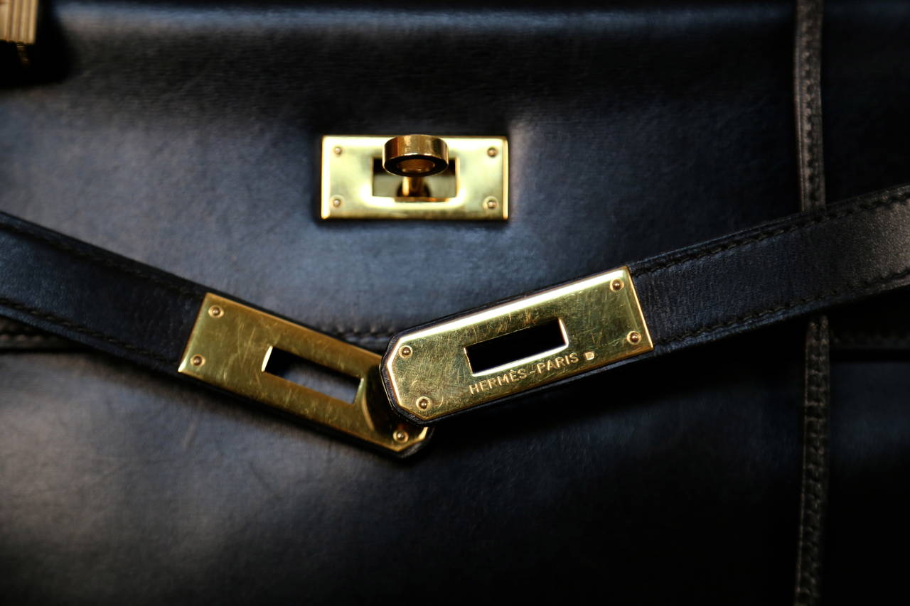 HERMES KELLY retourne 32 cm black veau box leather with canvas shoulder strap 3