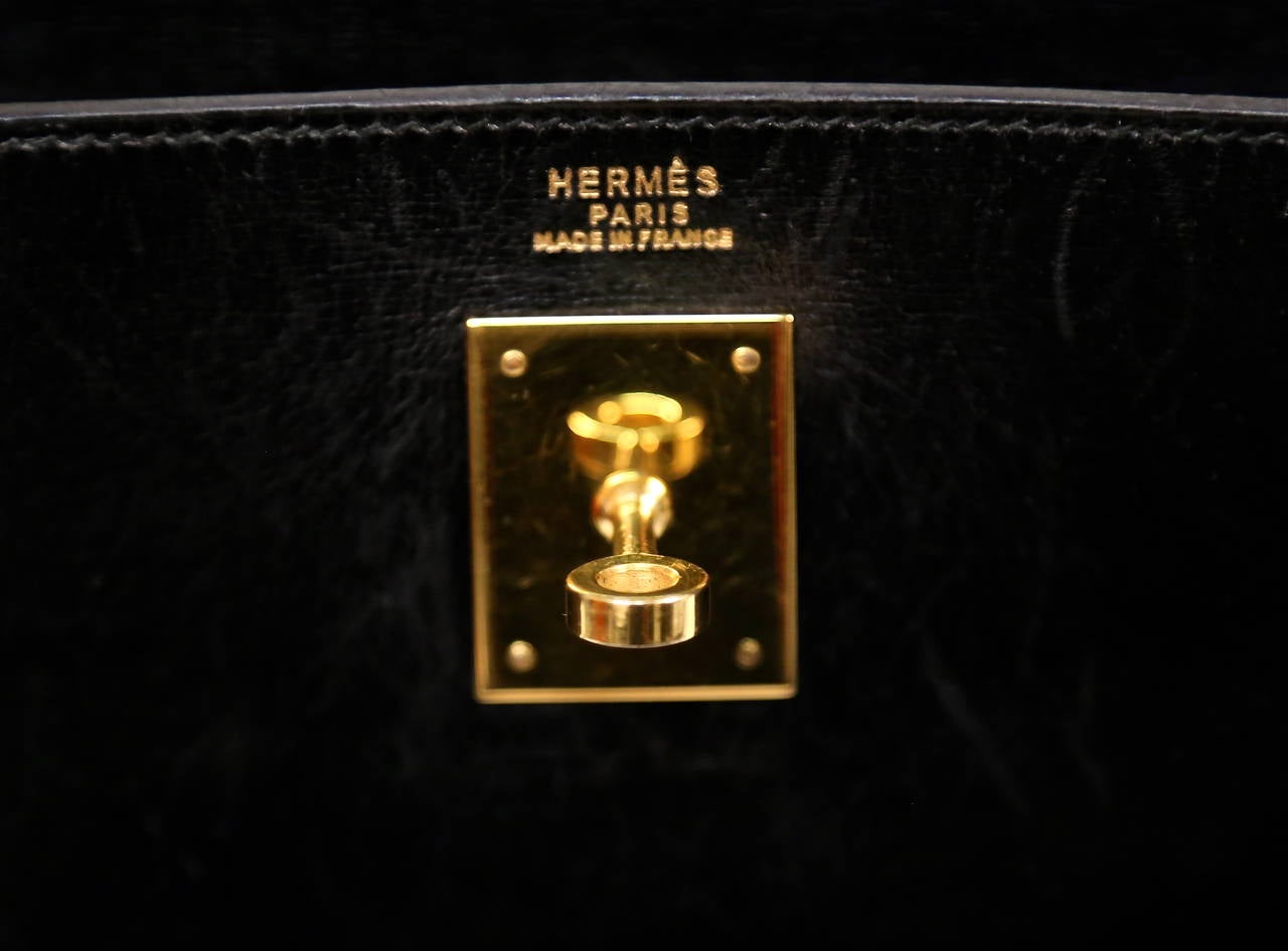 HERMES KELLY retourne 32 cm black veau box leather with canvas shoulder strap 4