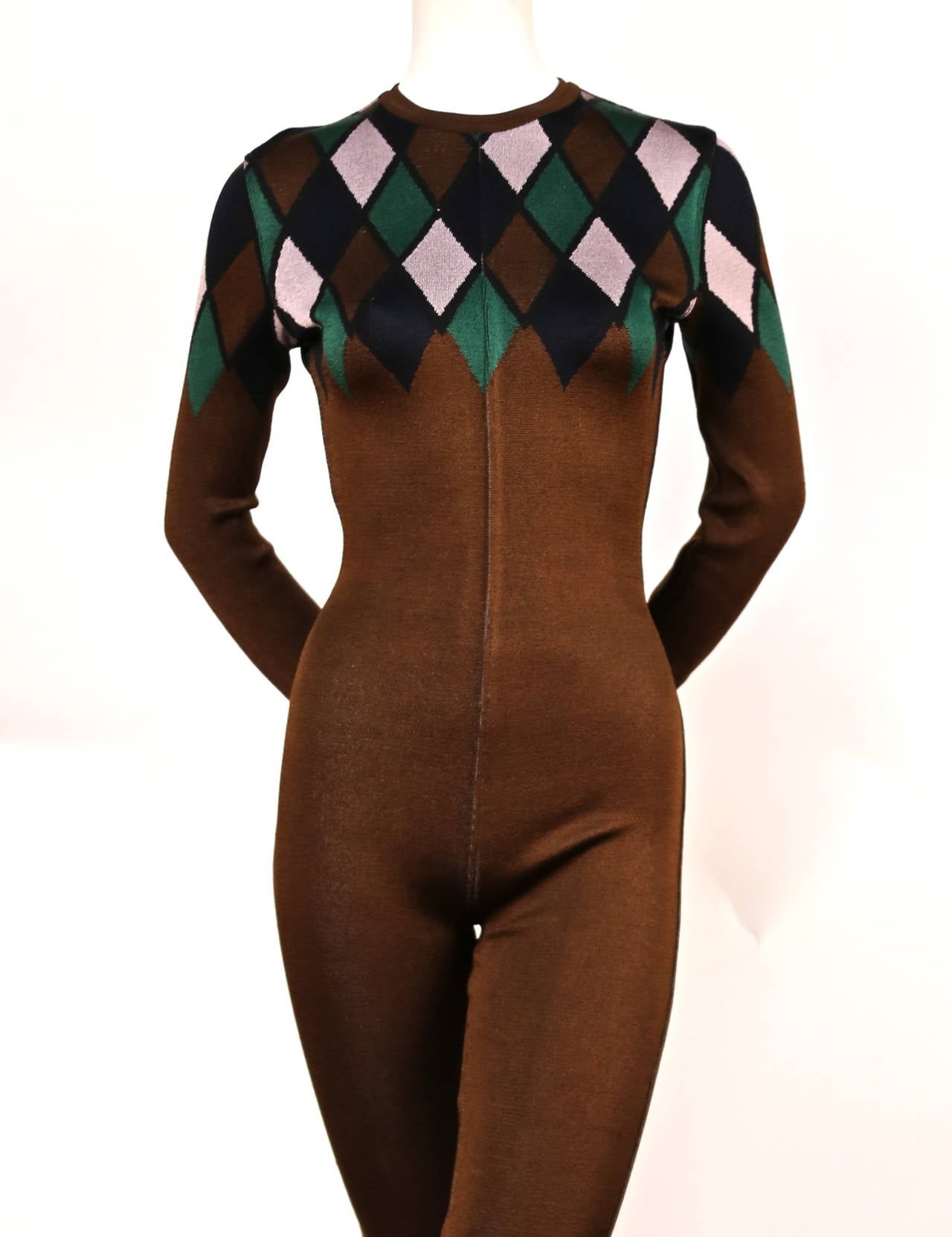 Very rare brown catsuit with harlequin diamonds designed by Azzedine Alaia dating to the 1990's. Labeled a size 'S'. Approximate measurements (unstretched): bust 32