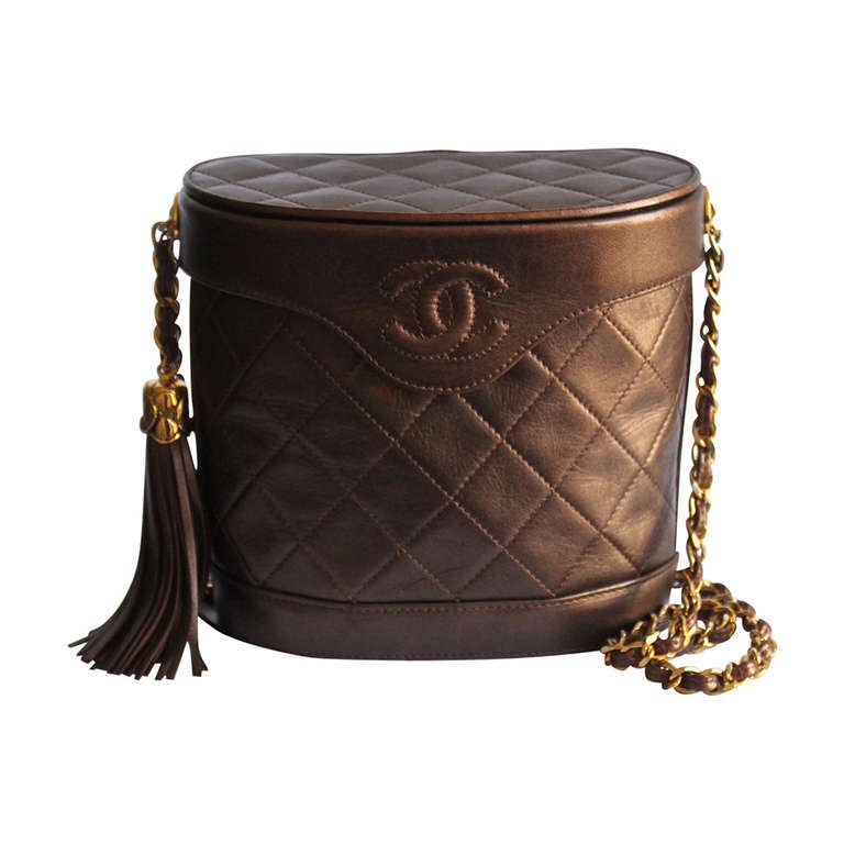 1980's CHANEL bronze quilted leather purse with long chain strap