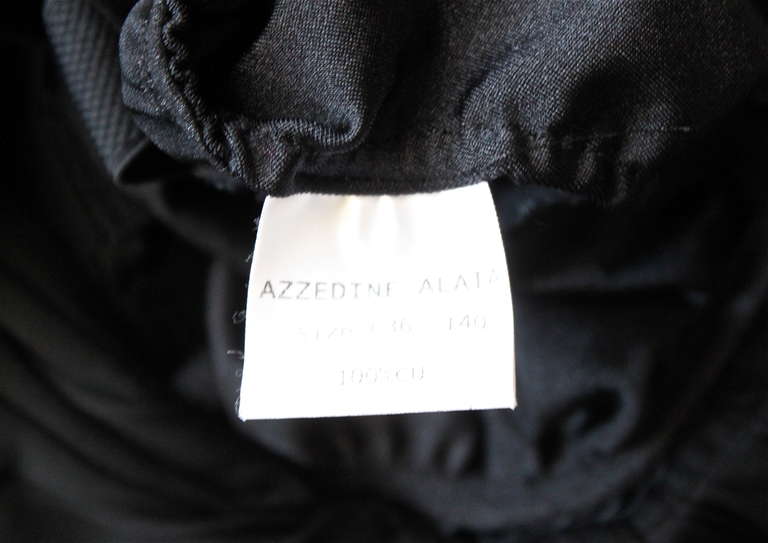 Women's AZZEDINE ALAIA black semi sheer ruched dress with cut out sides