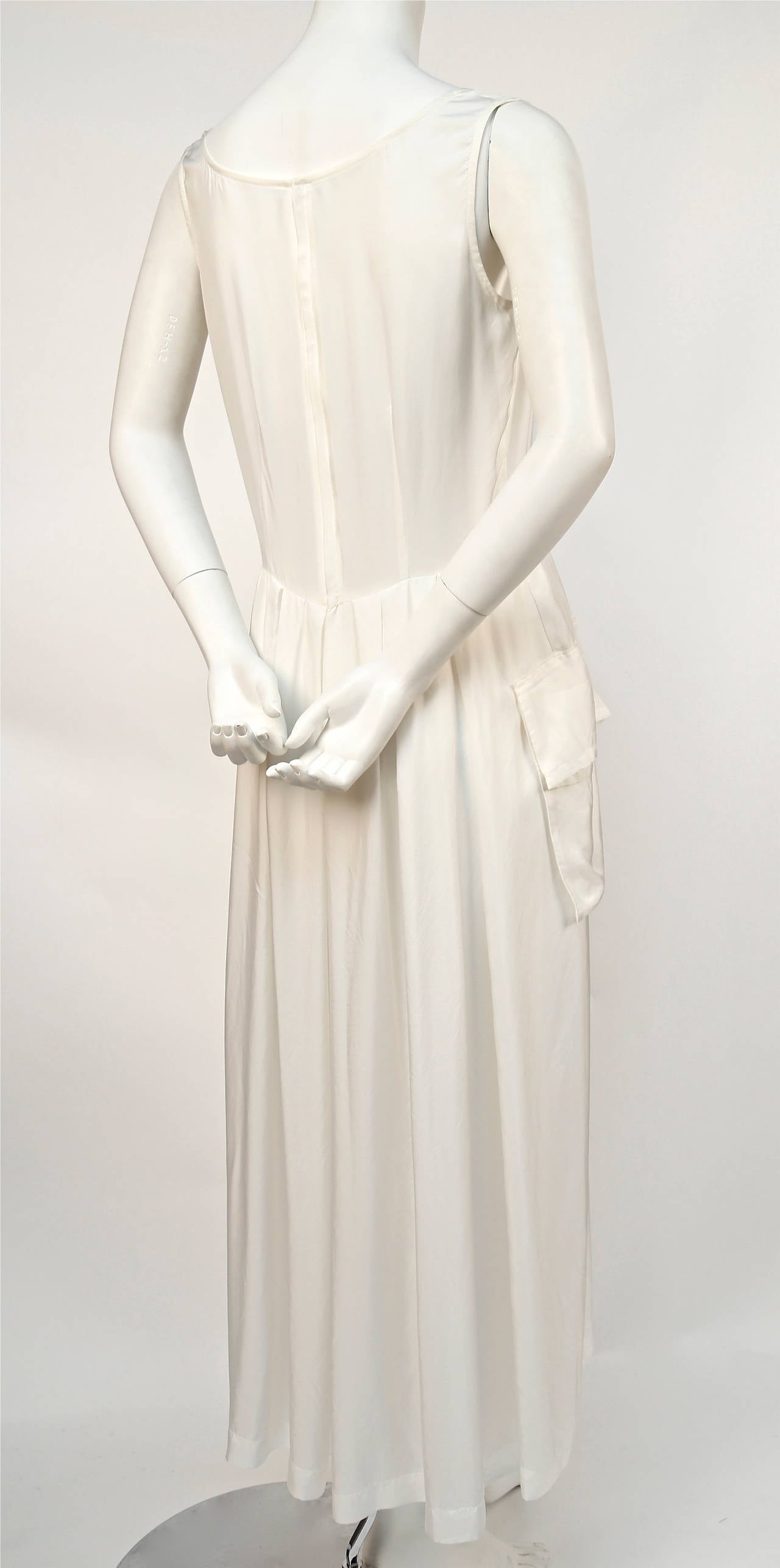 Women's COMME DES GARCONS cream nylon dress with unique floral appliques