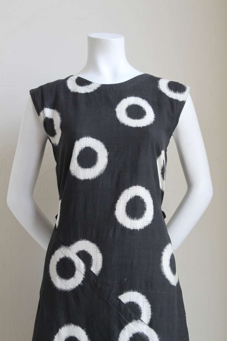 Soft black and off-white circular ikat printed cotton dress from Issey Miyake dating to the early 1980's. Fits a size S or possibly a size M. Approximate measurements are: bust 34
