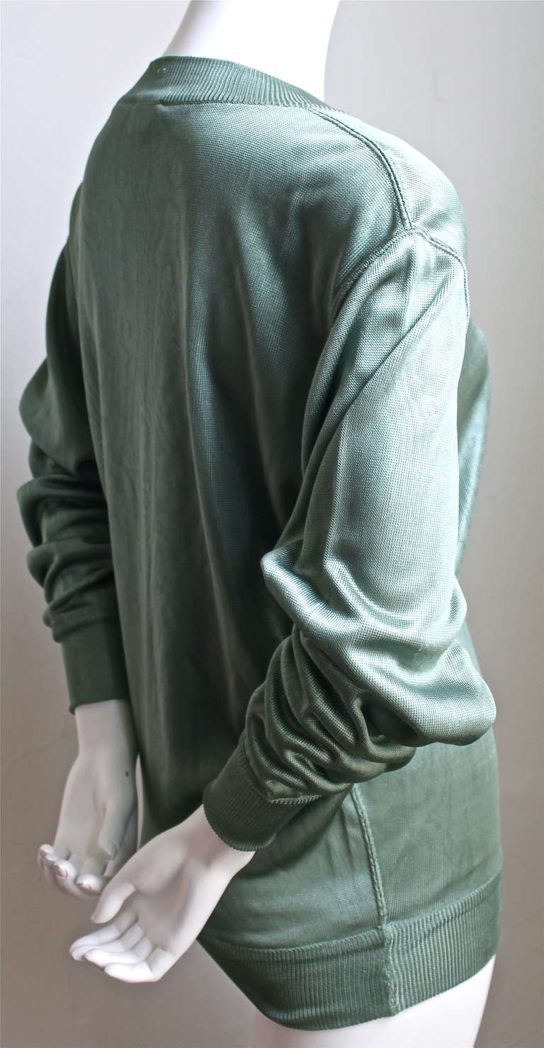 Unusual sea foam green viscose knit tunic pull over from Azzedine Alaia dating to the 1980's. Best fits a size S or M. Made in Italy.  Very good condition.