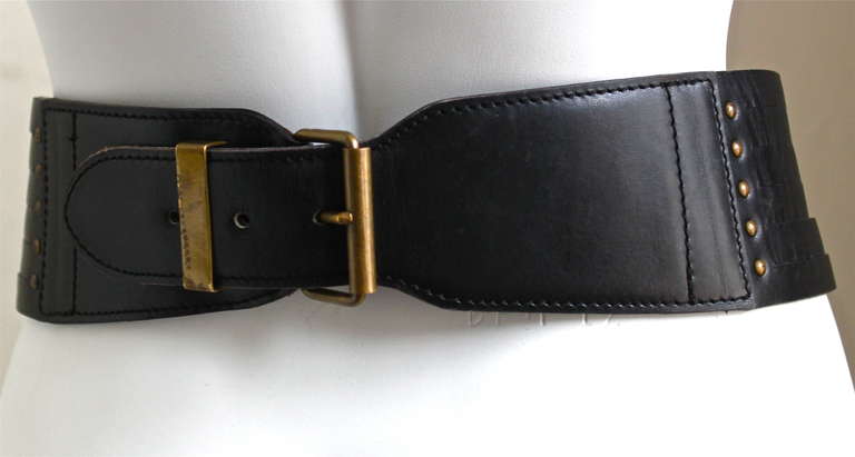 Jet black leather corset belt from Alaia dating to the 1990's. French size 75, which best fits a 28-31
