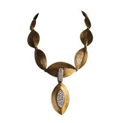 YVES SAINT LAURENT oversized gilt necklace with crystals