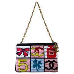 Vintage CHANEL needlepoint lucky charms patchwork pochette bag with gilt hardware