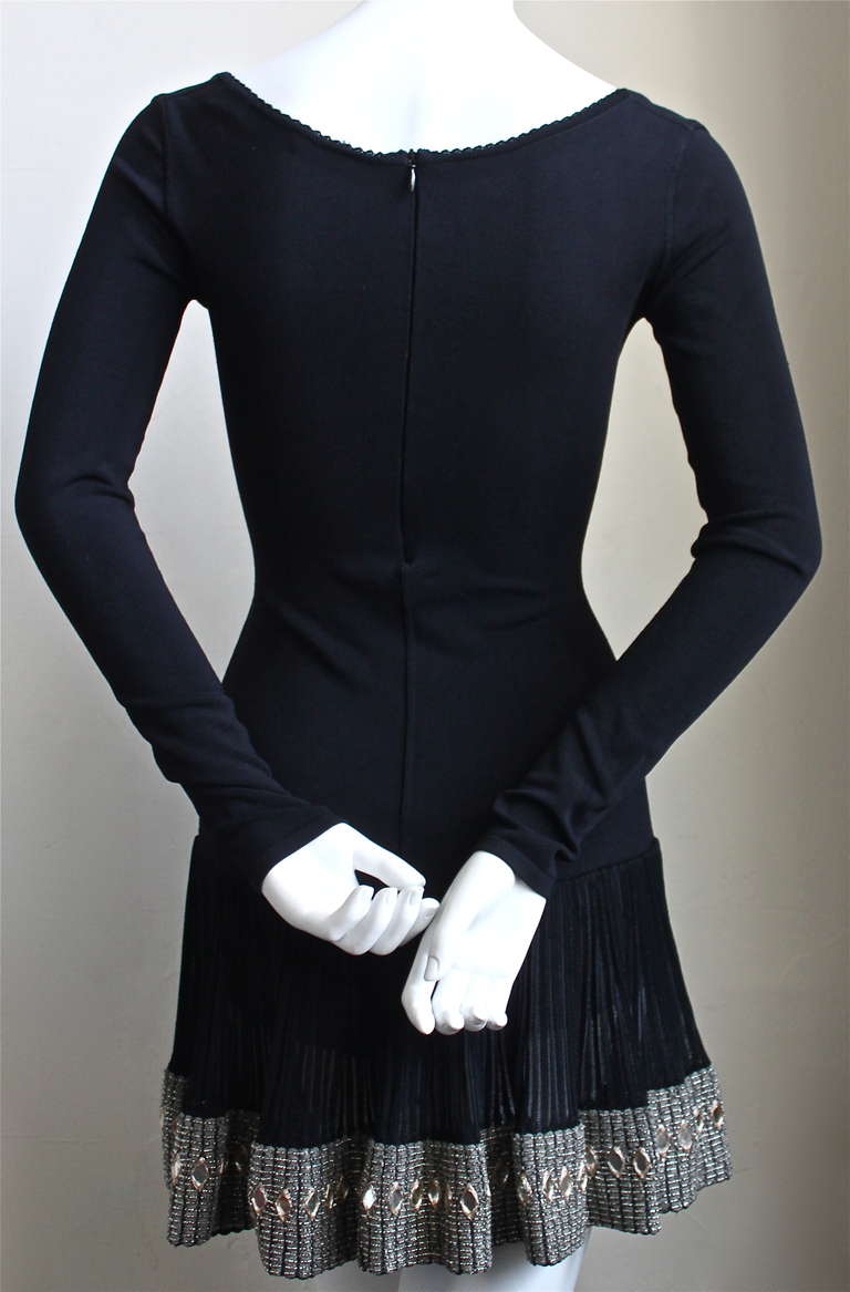 Women's very rare AZZEDINE ALAIA black mini dress with mirrored hemline