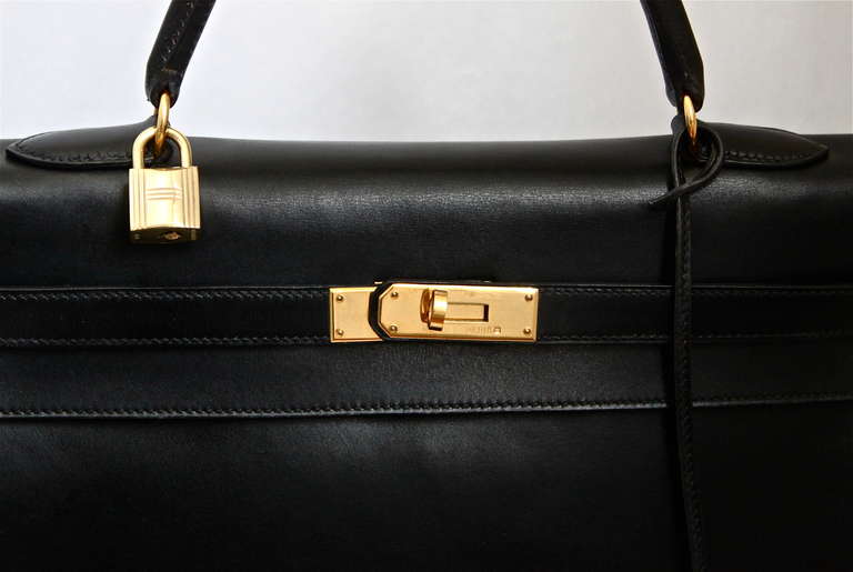 HERMES KELLY retourne 35 cm black veau box leather with shoulder strap