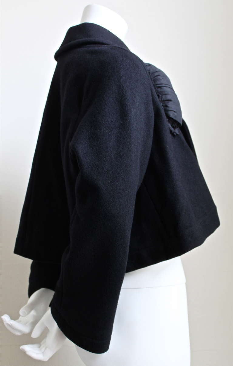COMME DES GARCONS cropped wool jacket with padded appliques