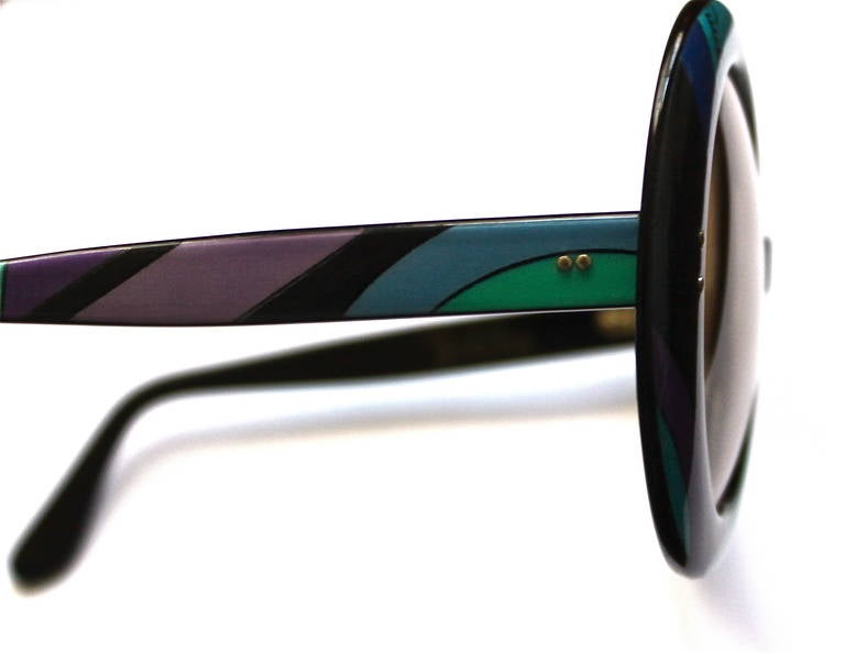 Very rare round graphic sunglasses from Emilio Pucci dating to the 1960's.  Sunglasses measure approximately: 7