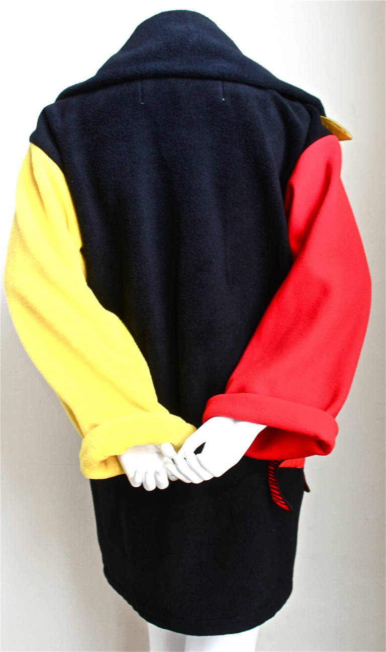 Very rare color blocked fleece coat with three-dimensional fish from Jean Charles de Castelbajac dating to the 1980's. Labeled a French size 38. Approximate measurements: drop shoulder 22
