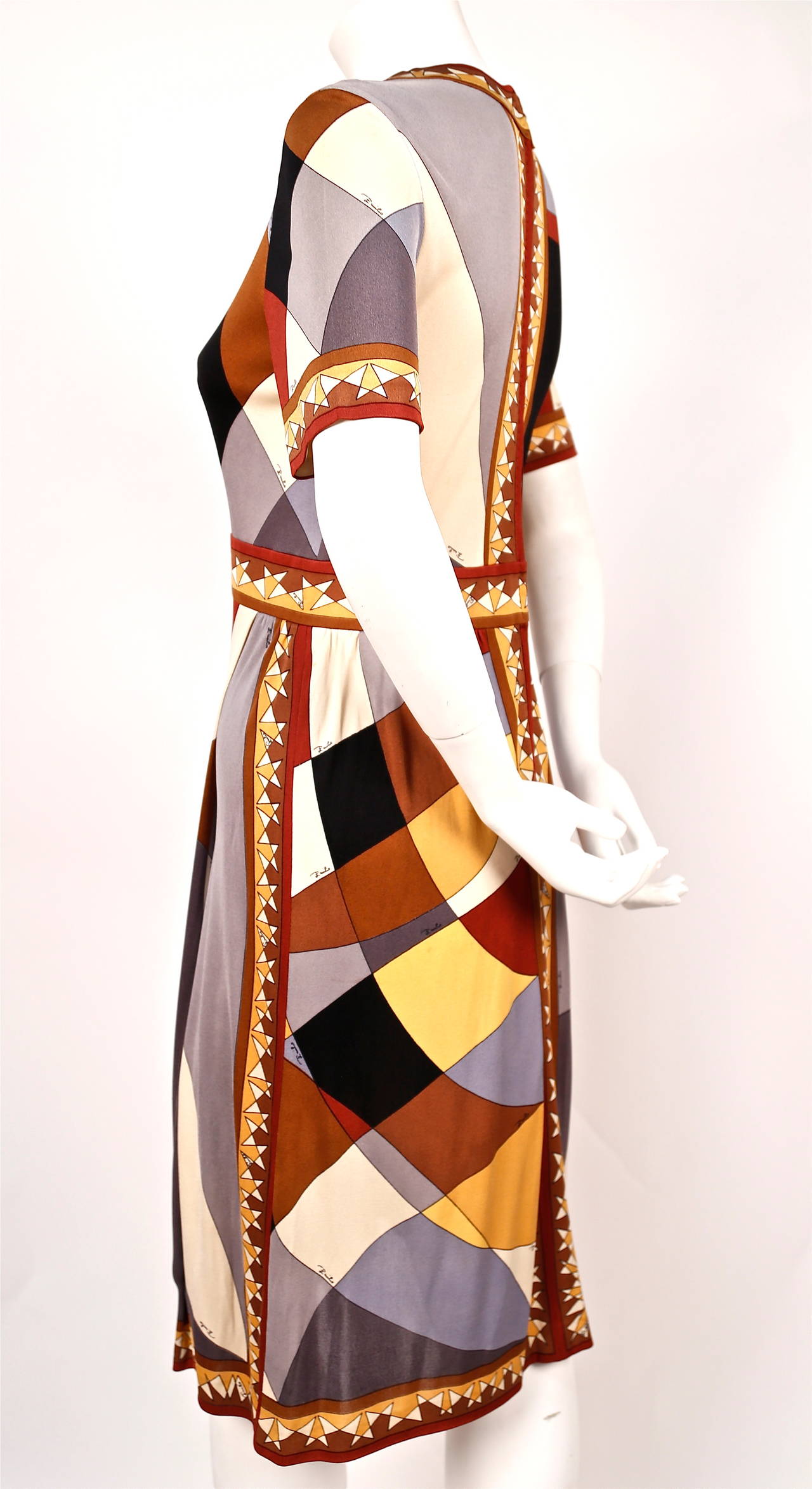 Vivid geometric printed silk jersey dress from Emilio Pucci dating to the 1960's. Fits a size 4-6. Approximate measurements: 16