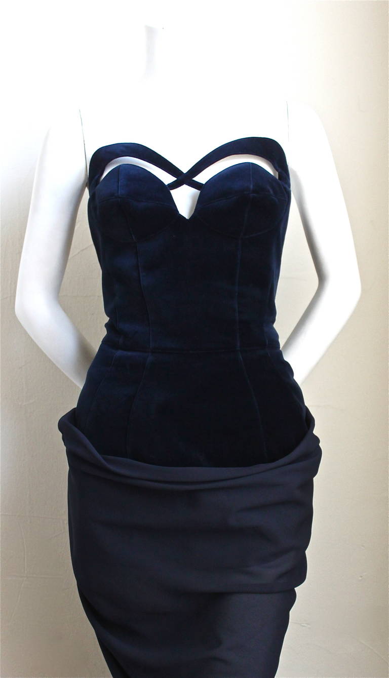 Very rare midnight blue velvet gown with georgette bustle from Thierry Mugler dating to 1992.  Dress has a body suit that you step into and has a very structured bodice. Labeled a French size 42. Approximate measurements: bust 37