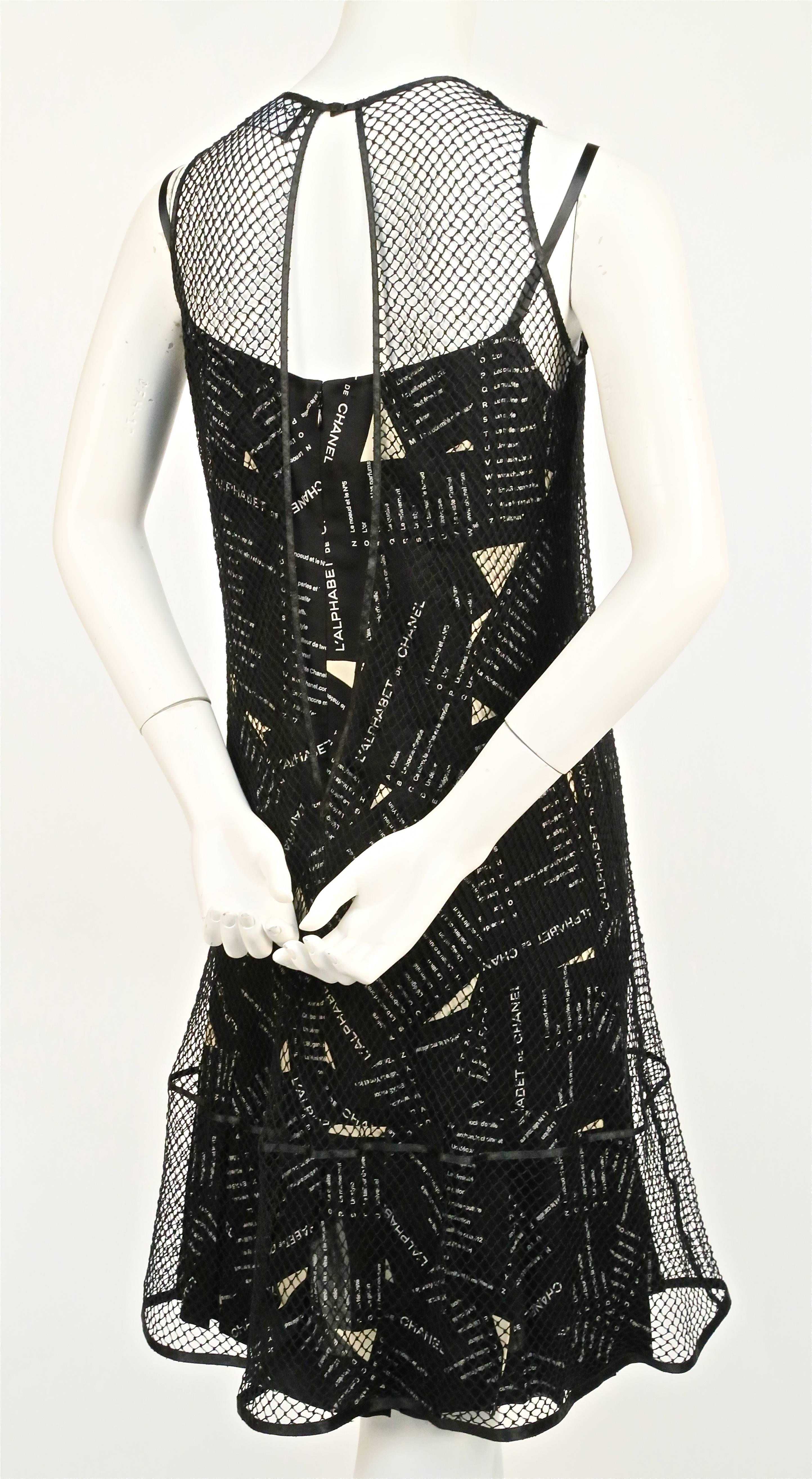 Black CHANEL silk printed dress with sheer net overlay - runway fall 2005 