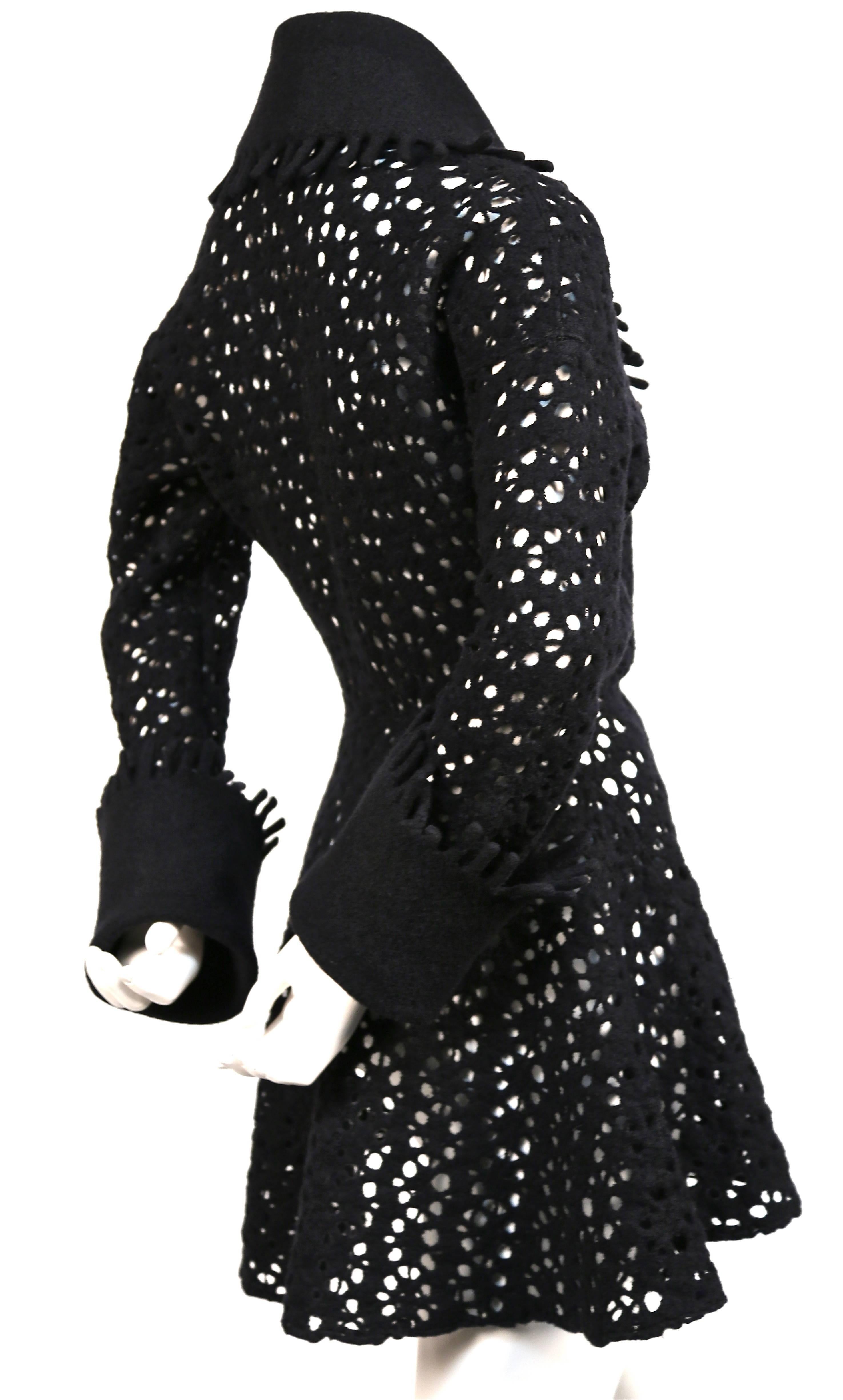 Black 1990's AZZEDINE ALAIA black open knit jacket with flared hem and fringed trim