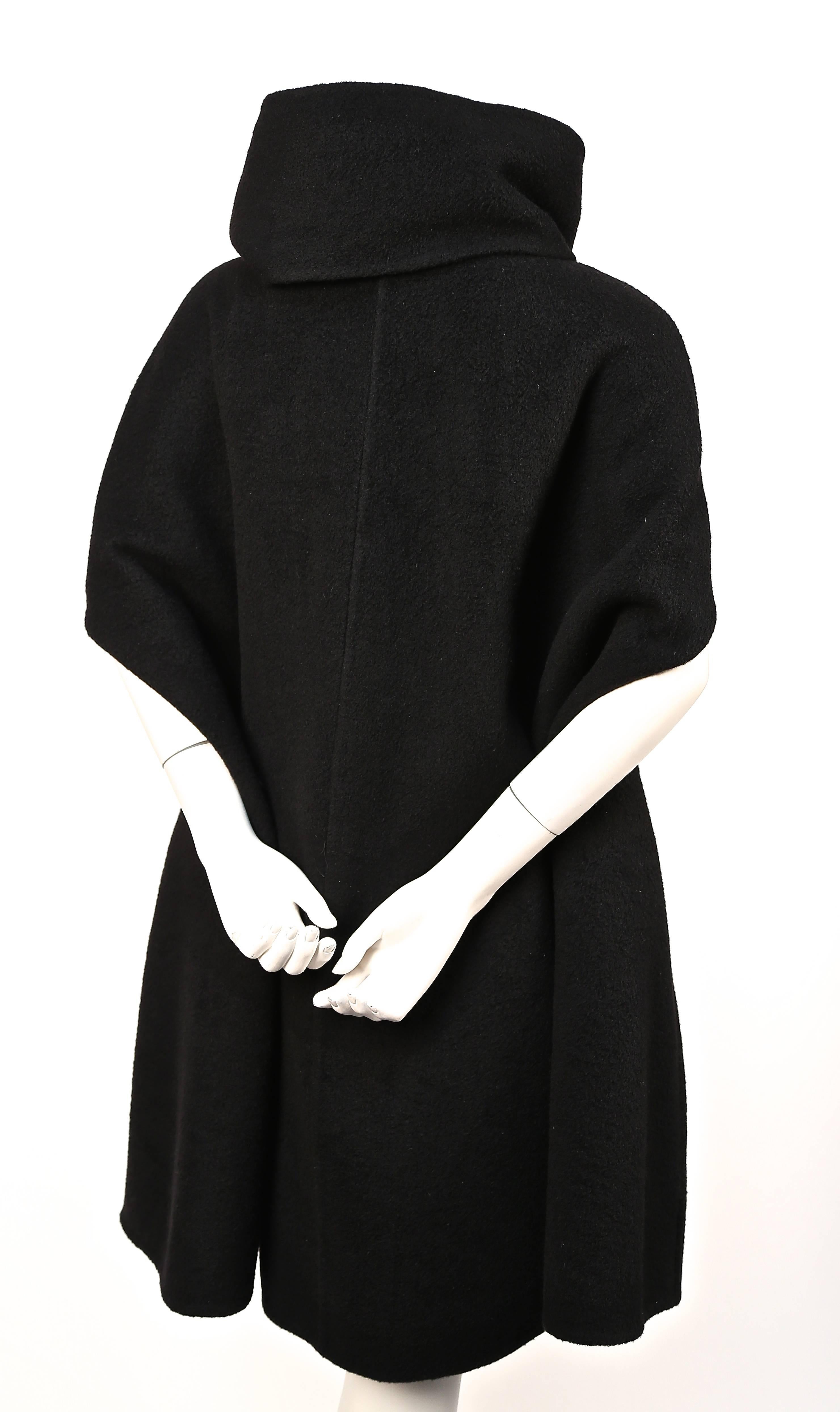 Jet black super soft cashmere cape coat with flared shape and draped neckline from Rick Owens. Italian size 44 which best fits a US 8 or 10. Made in Italy. 100% cashmere. Snap closure. Unlined.  Very good condition. 