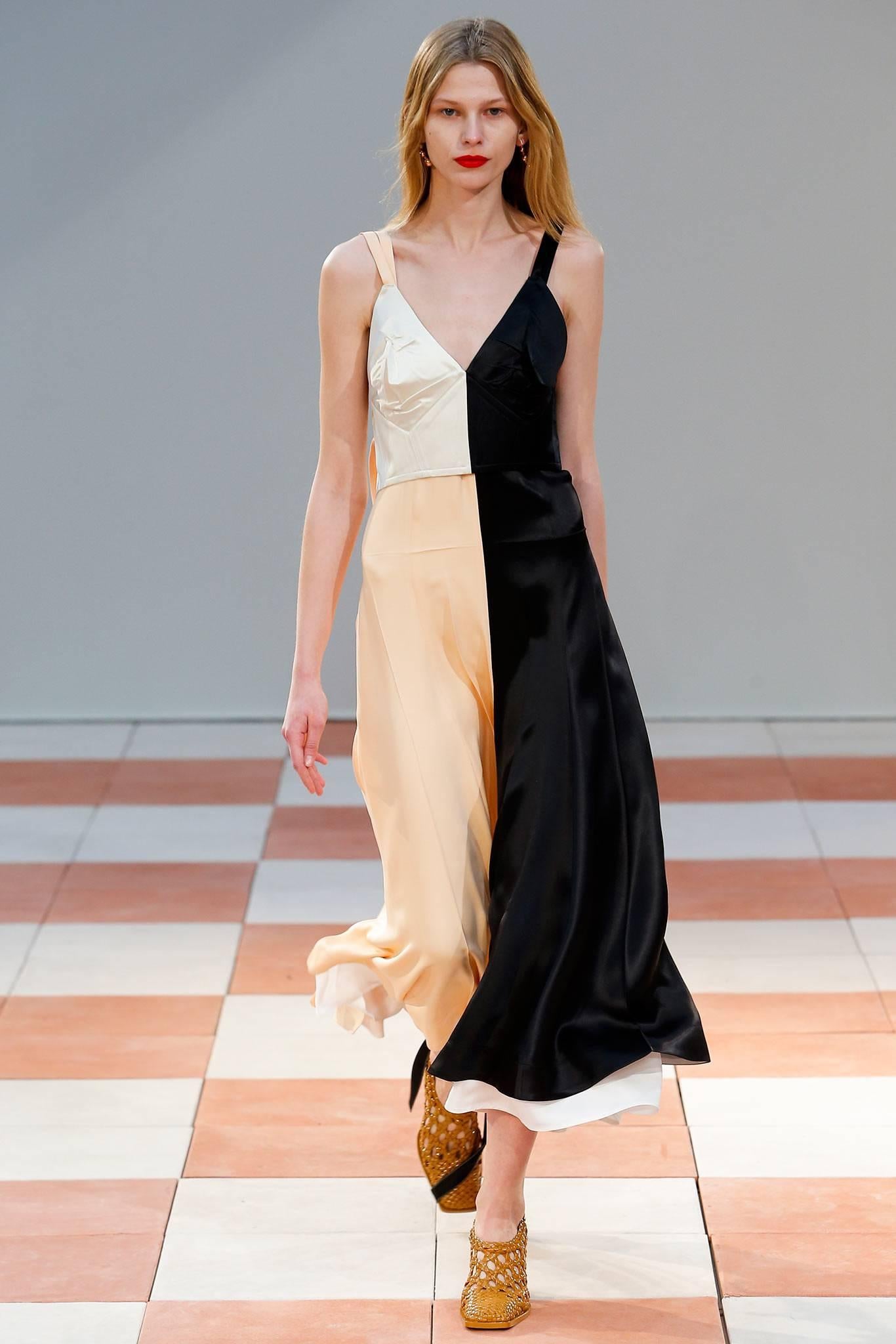 Well documented silk color-blocked layered slip dress with bustier and long ties designed by Phoebe Philo for Celine exactly as seen on the runway for fall of 2015. Labeled a French size 36 (32" maximum bust). Dress creates beautiful movement