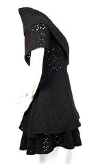 AZZEDINE ALAIA black open knit jacket with flared hem and matching skirt