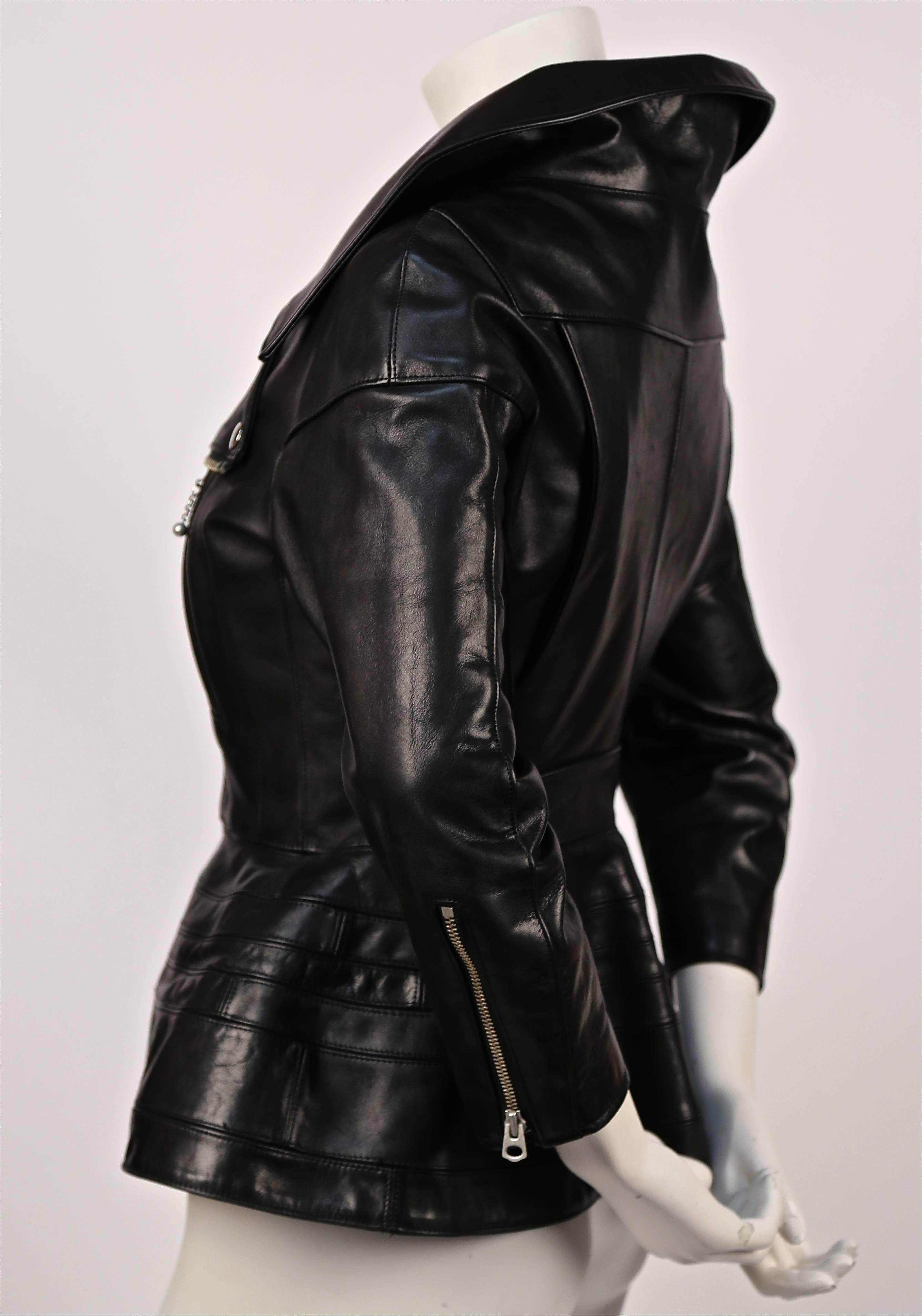 Jet black leather jacket with portrait collar and three-quarter sleeves from Junya Watanabe for Comme des Garcons exactly as seen on the runway for fall 2011. Size S. Approximate measurements: shoulder 14", bust 34", high waist 27"
