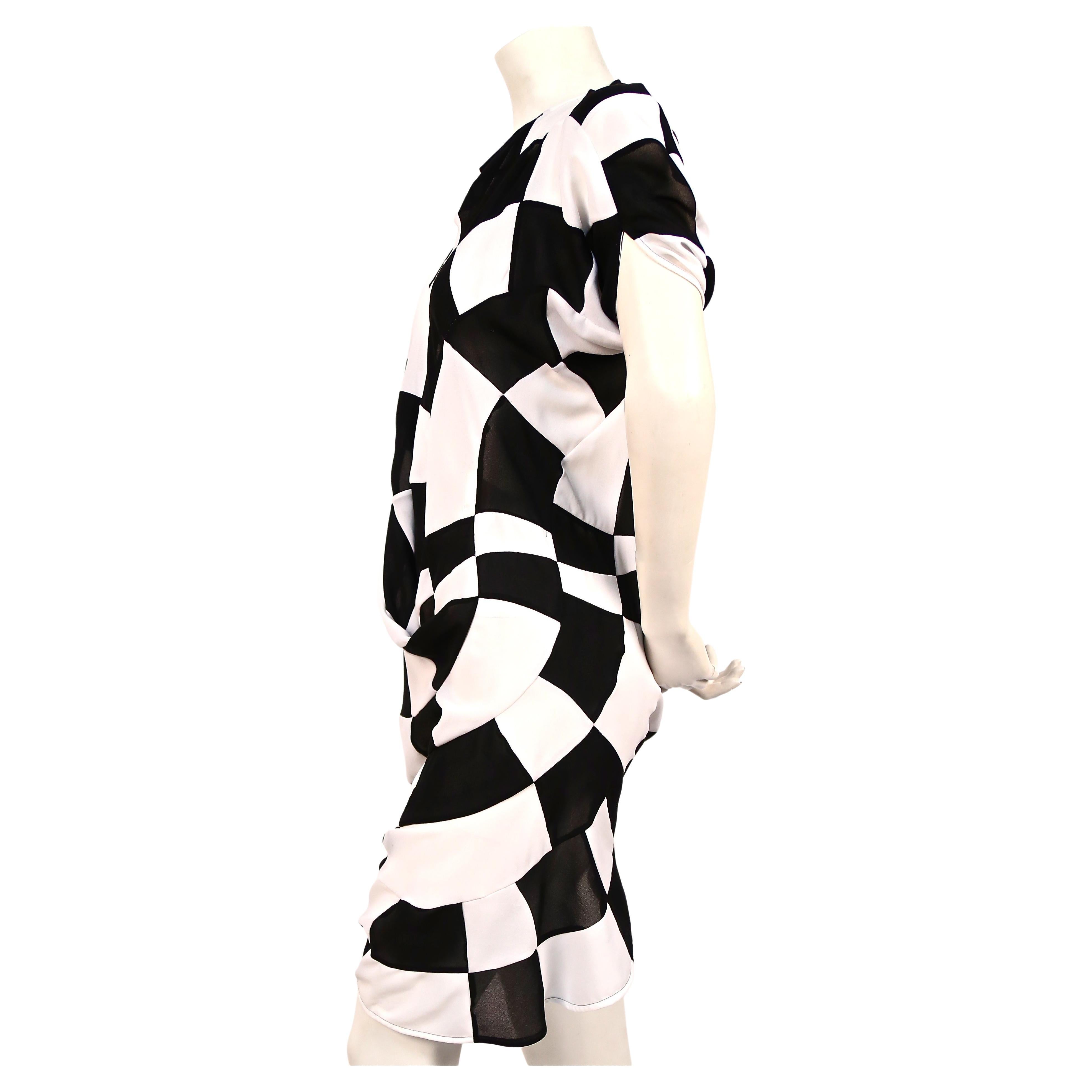 Black and white checkered patchwork dress with elaborate draping designed by Junya Watanabe for Comme des Garcons dating to 2010. Size 'S'. Approximate measurements 34