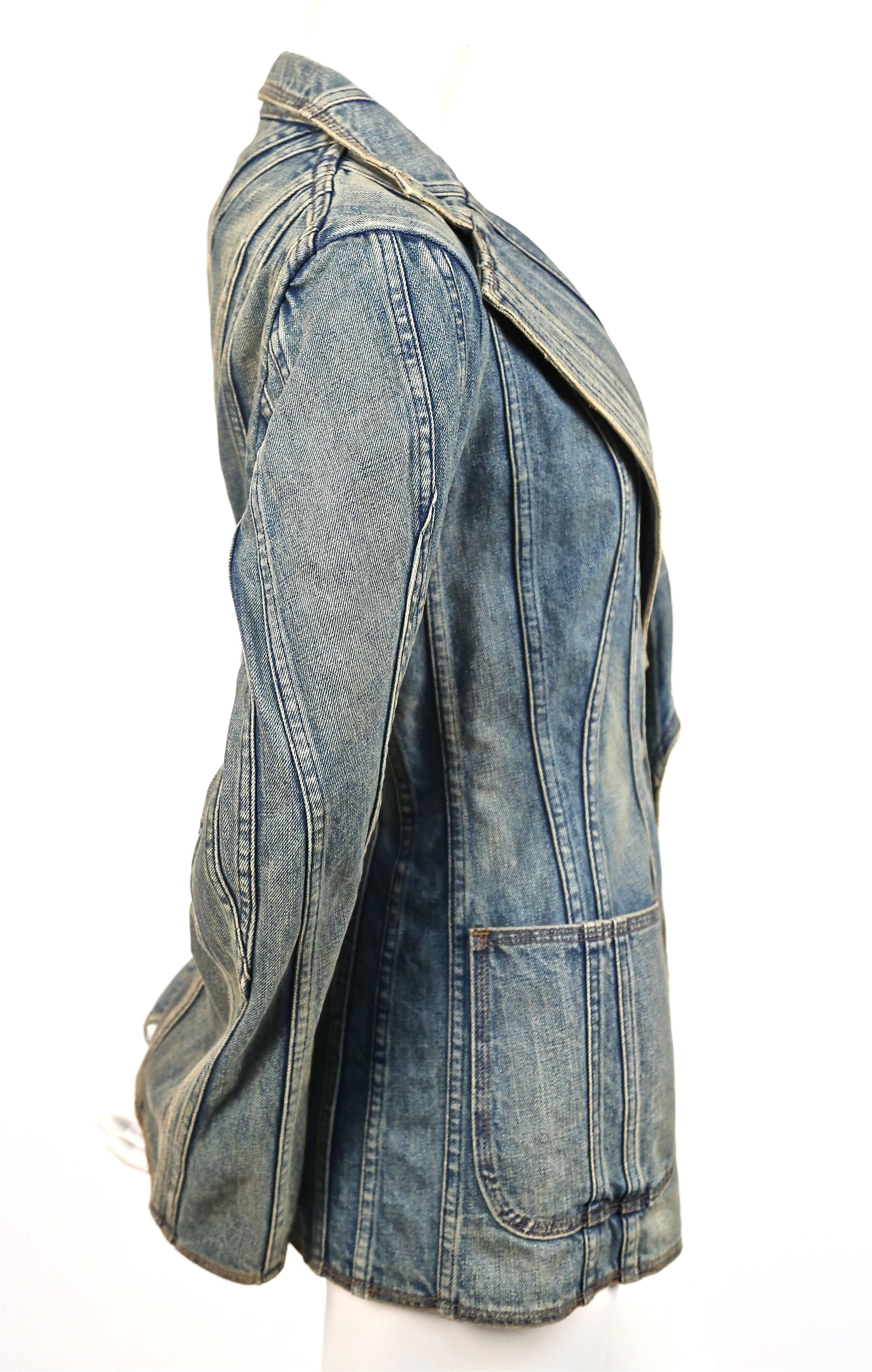 Very unique seamed denim jacket by Junya Watanabe for Comme des Garcons dating to spring of 2002, exactly as seen on the runway. Labeled a size 'M'. Approximate measurements: bust 35.5