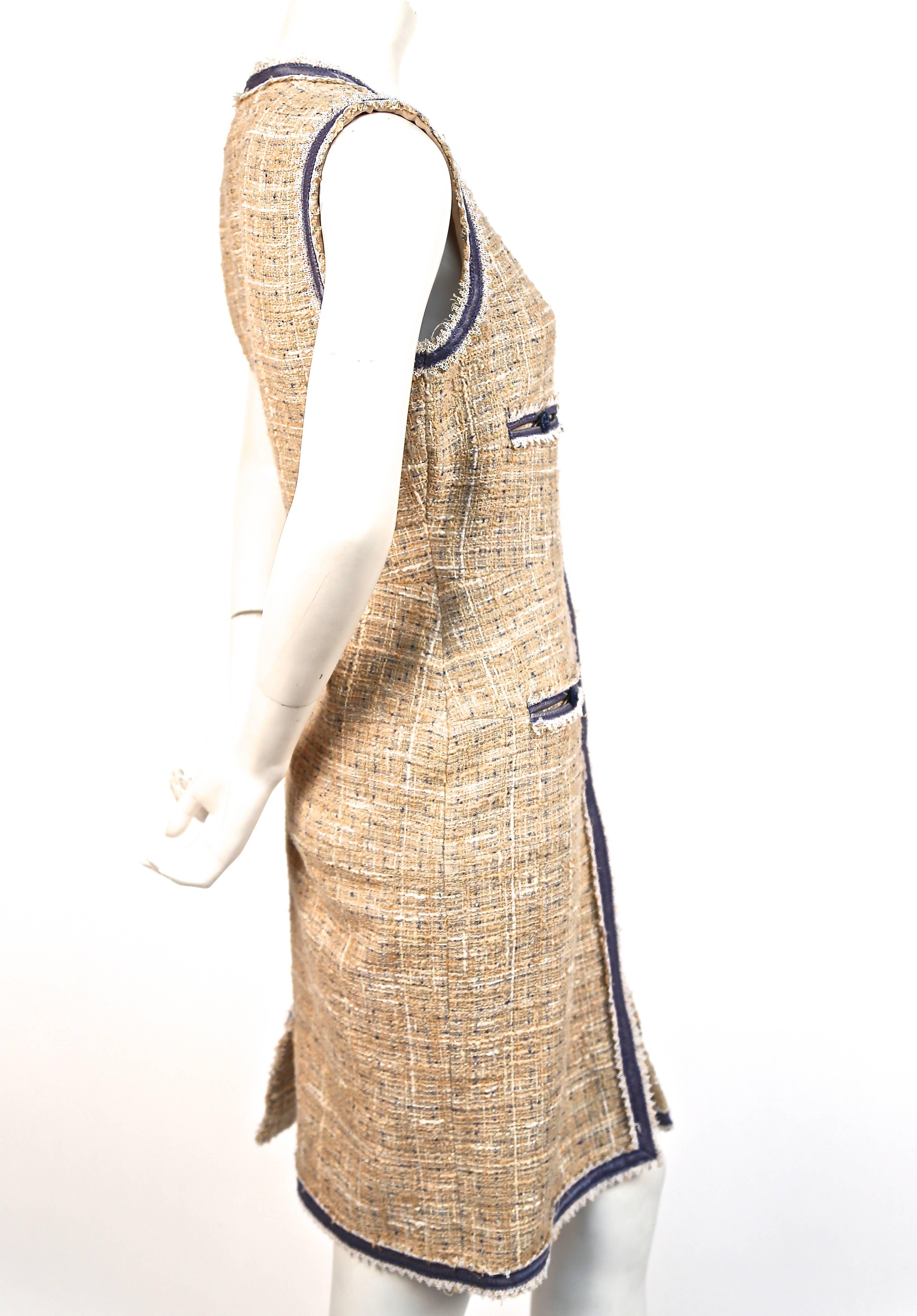 Tan, cream and blue Lesage tweed dress with lace trim and full two-way silver toned zipper from Chanel dating to spring of 2009. Labeled a French size 42. Approximate measurements: shoulder 15