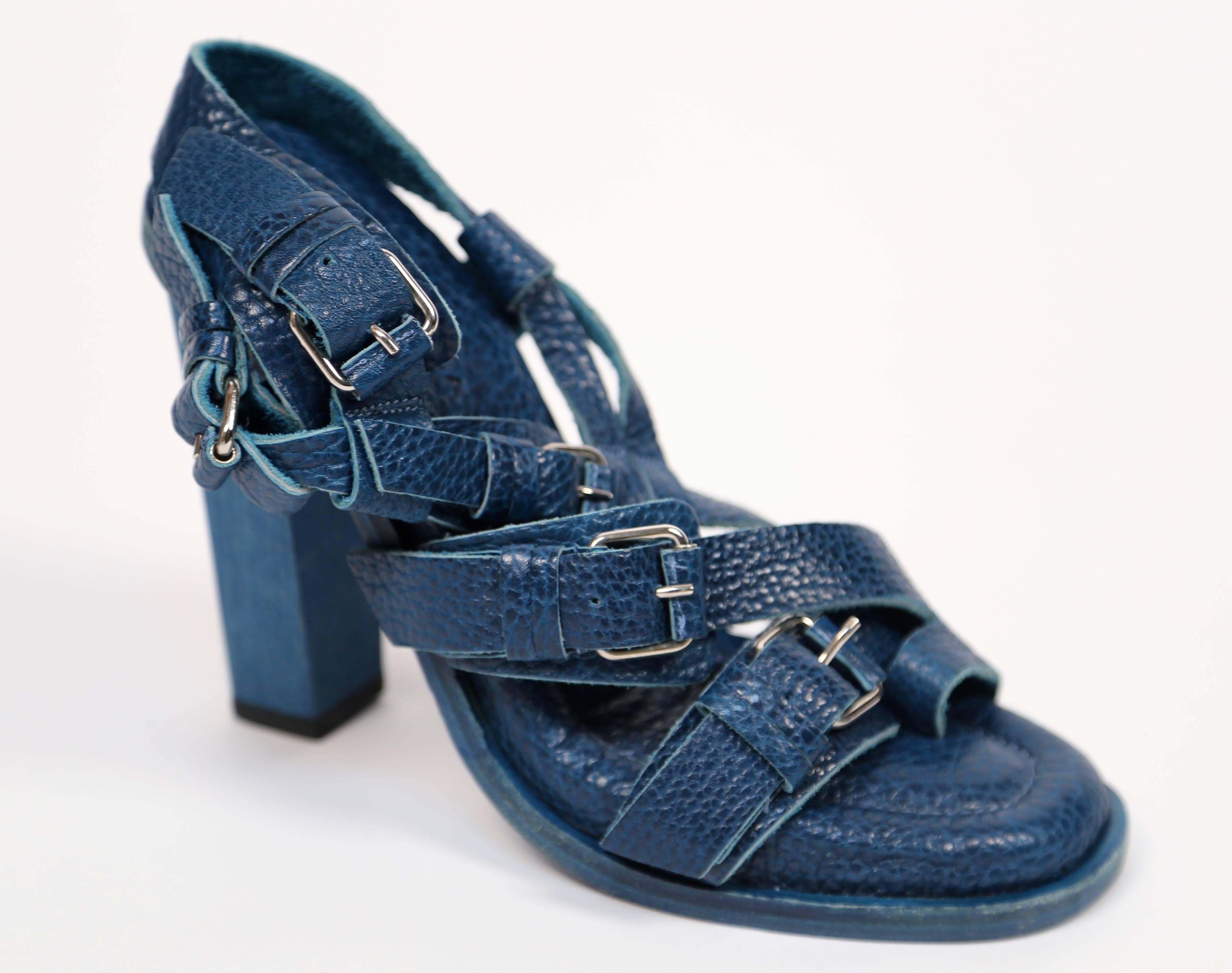 Turquoise leather sandals with silver buckles as featured on every model for spring 2003 Balenciaga show. Designed by Nicolas Ghesquière. French size 36. Insoles measures approximately 9.25