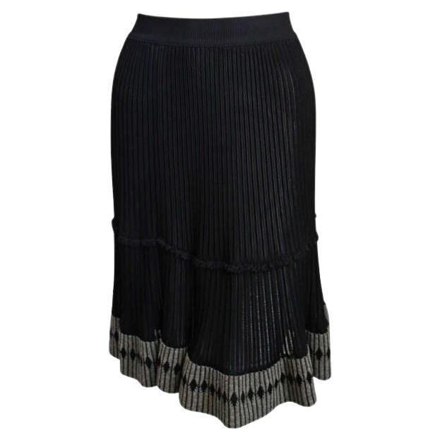 Gonna Azzedine Alaia nera semitrasparente con bordi a contrasto, anni '90