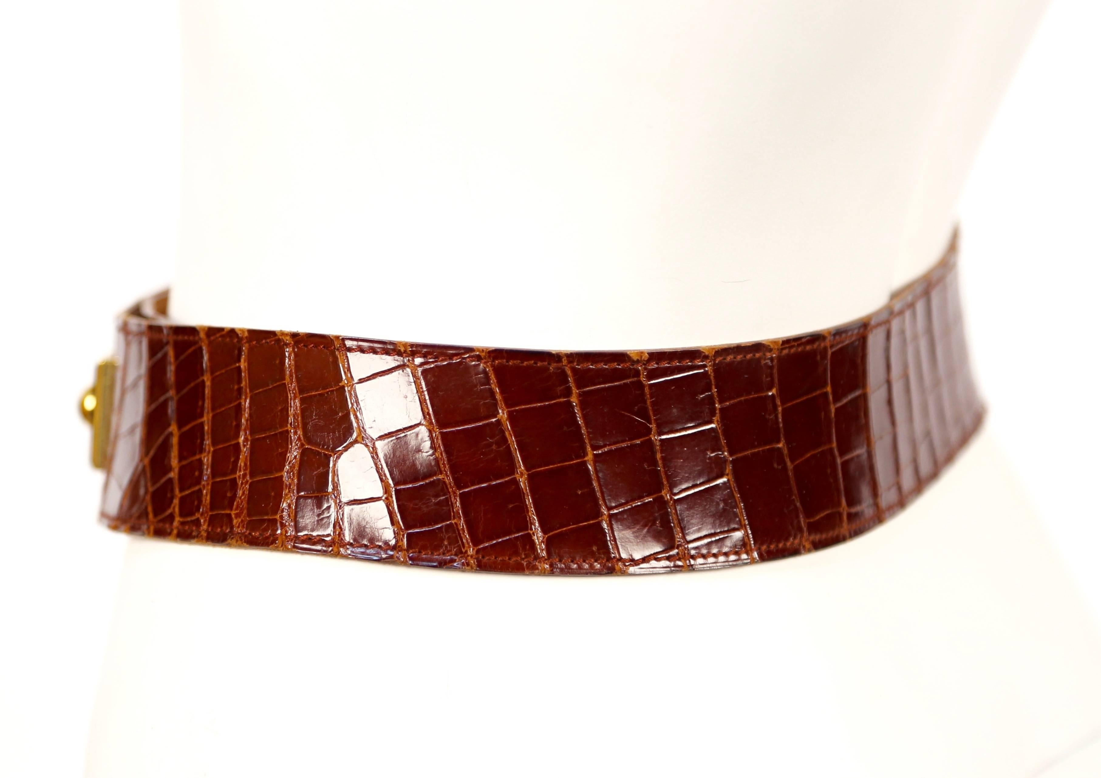 Very rare, rich brown crocodile belt from Hermes dating to the late 1960's. Belt fits a 24-27