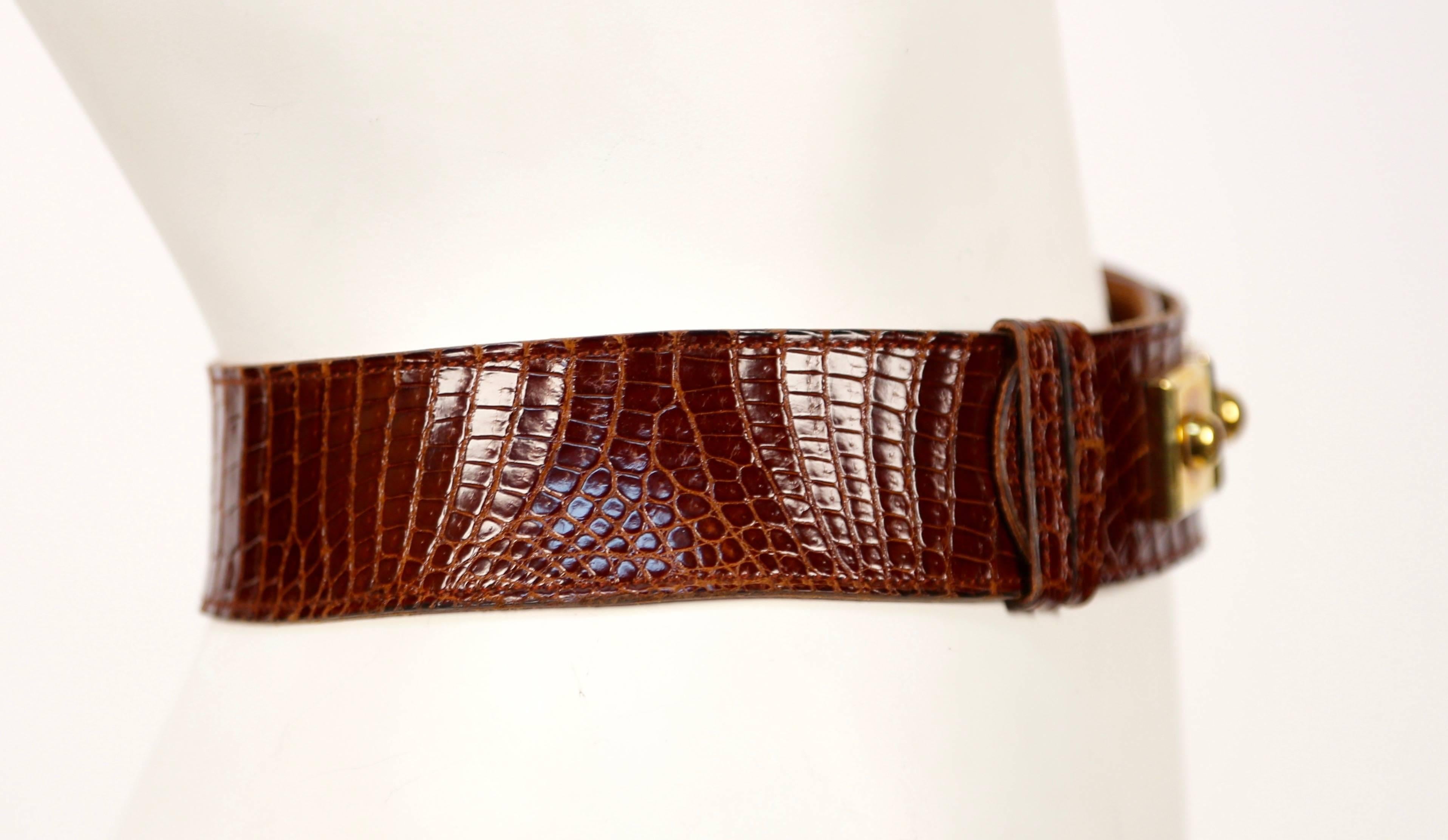 Brown 1960's HERMES brown alligator leather belt with gilt hardware