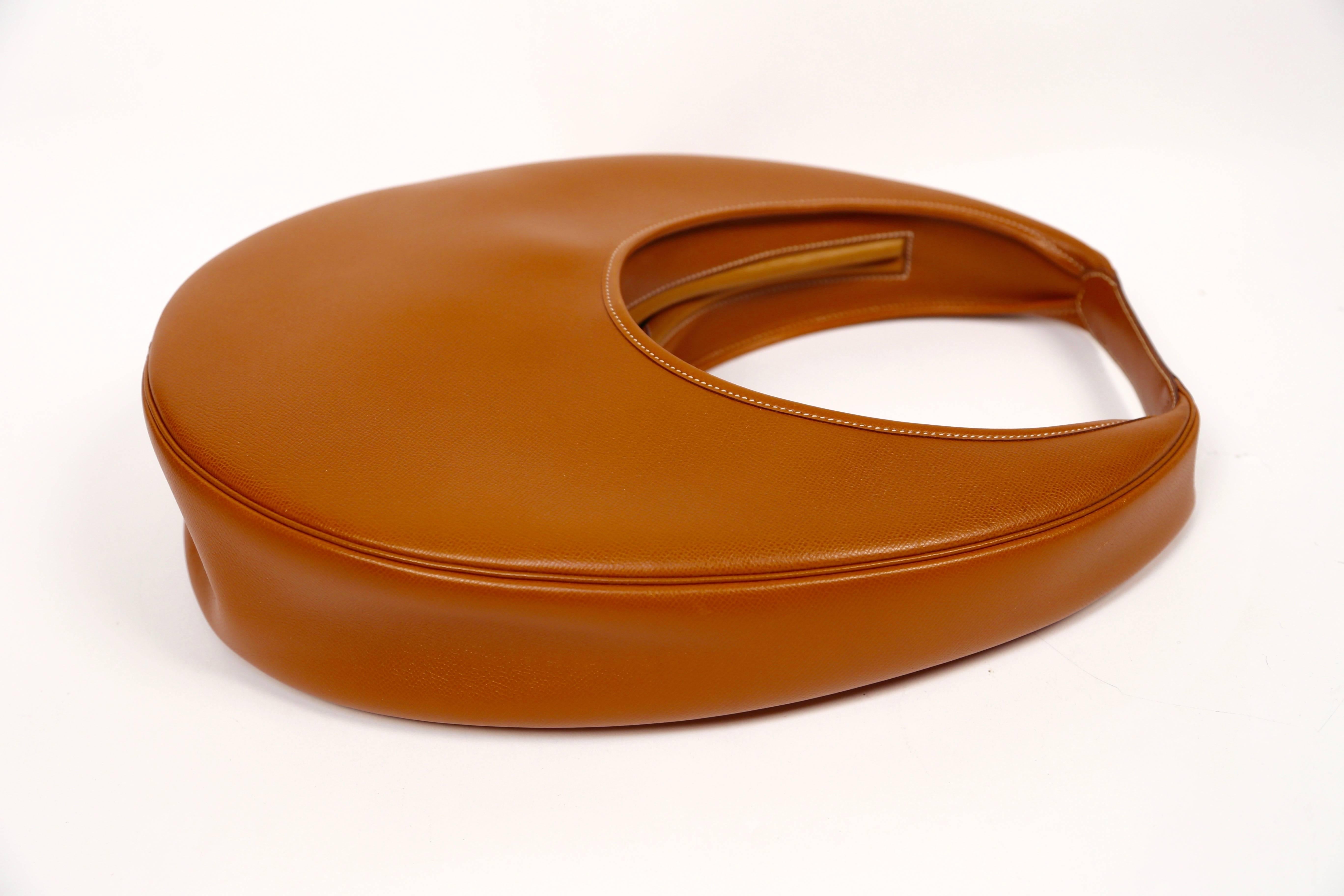 Brown very rare 1989 HERMES courchevel leather circular 'Folies' bag