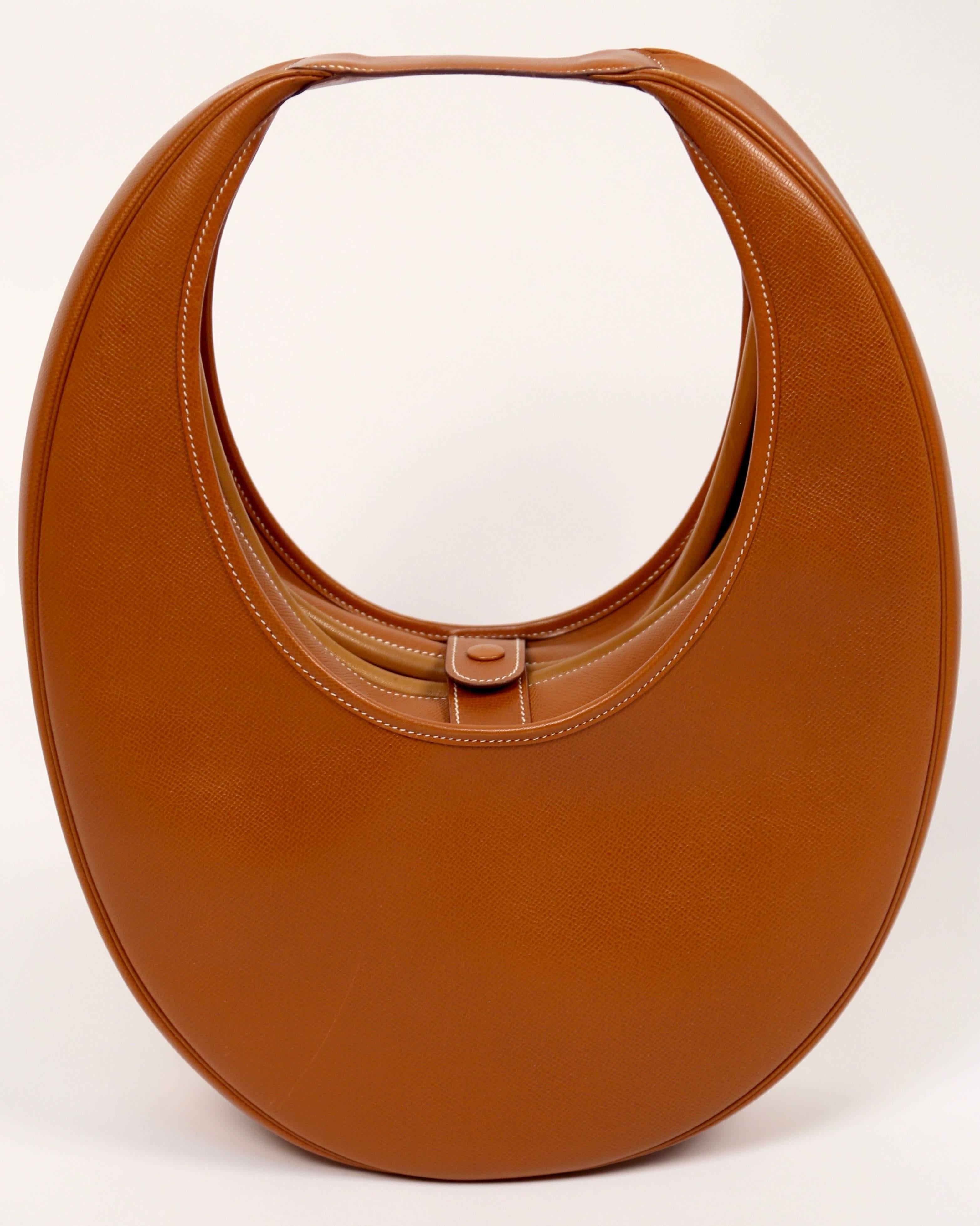 Women's or Men's very rare 1989 HERMES courchevel leather circular 'Folies' bag
