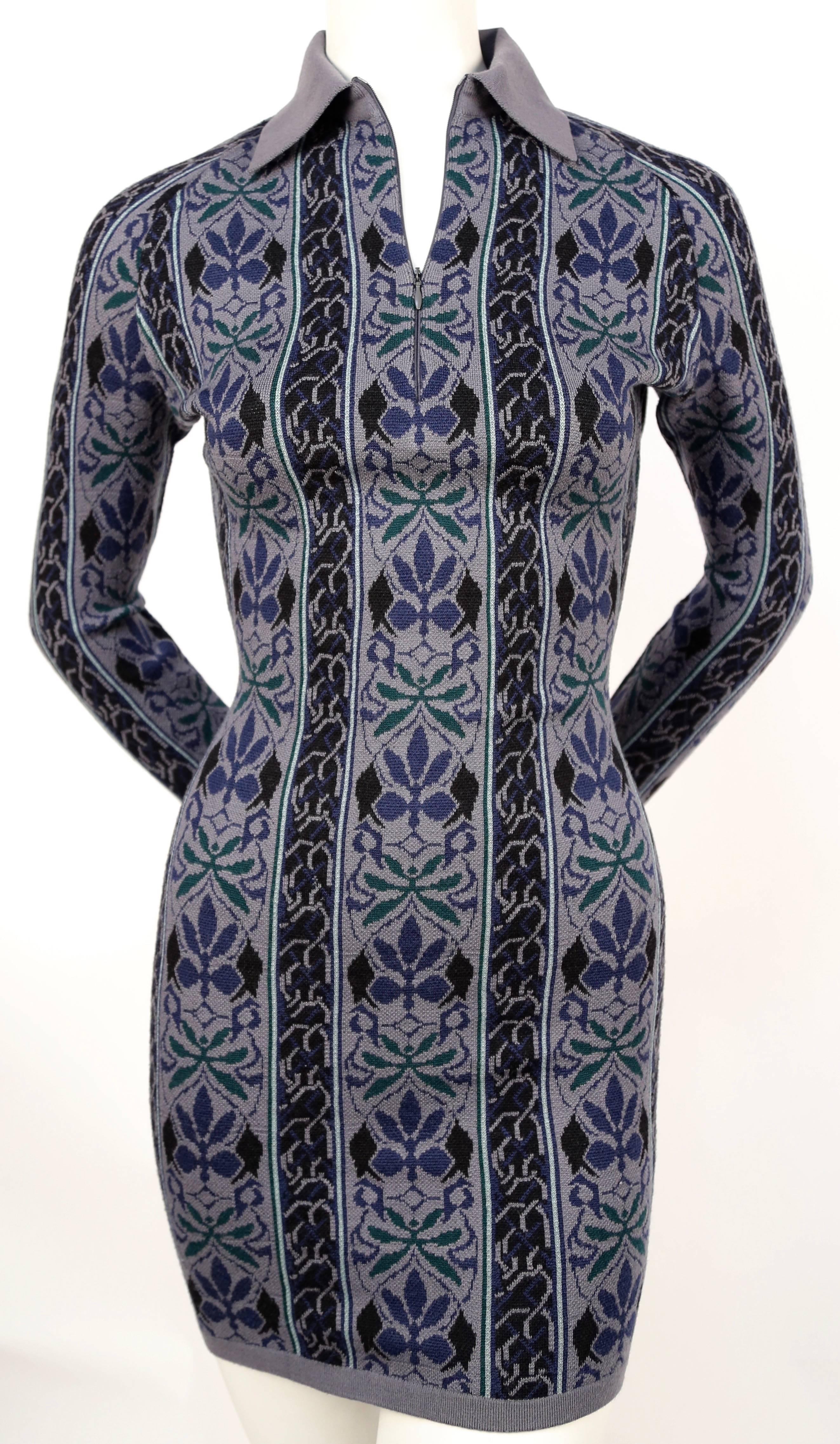 Very rare knit dress with woven abstract floral motif designed by Azzedine Alaia dating to fall of 1990. Size M however this would better suit a S. Approximate measurements (unstretched): shoulder 14
