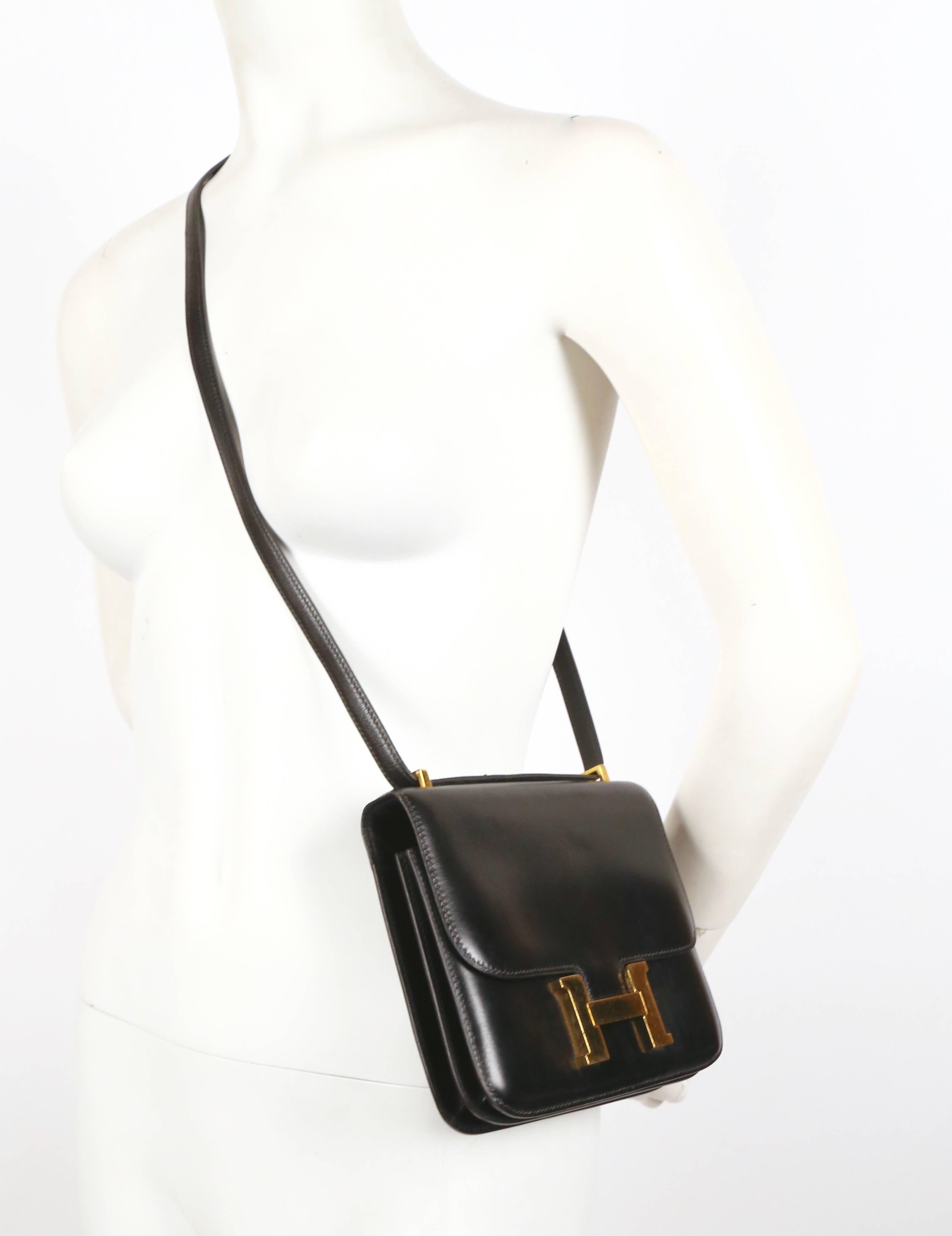 Women's or Men's HERMES Constance 'mini' black leather with gold hardware 18cm