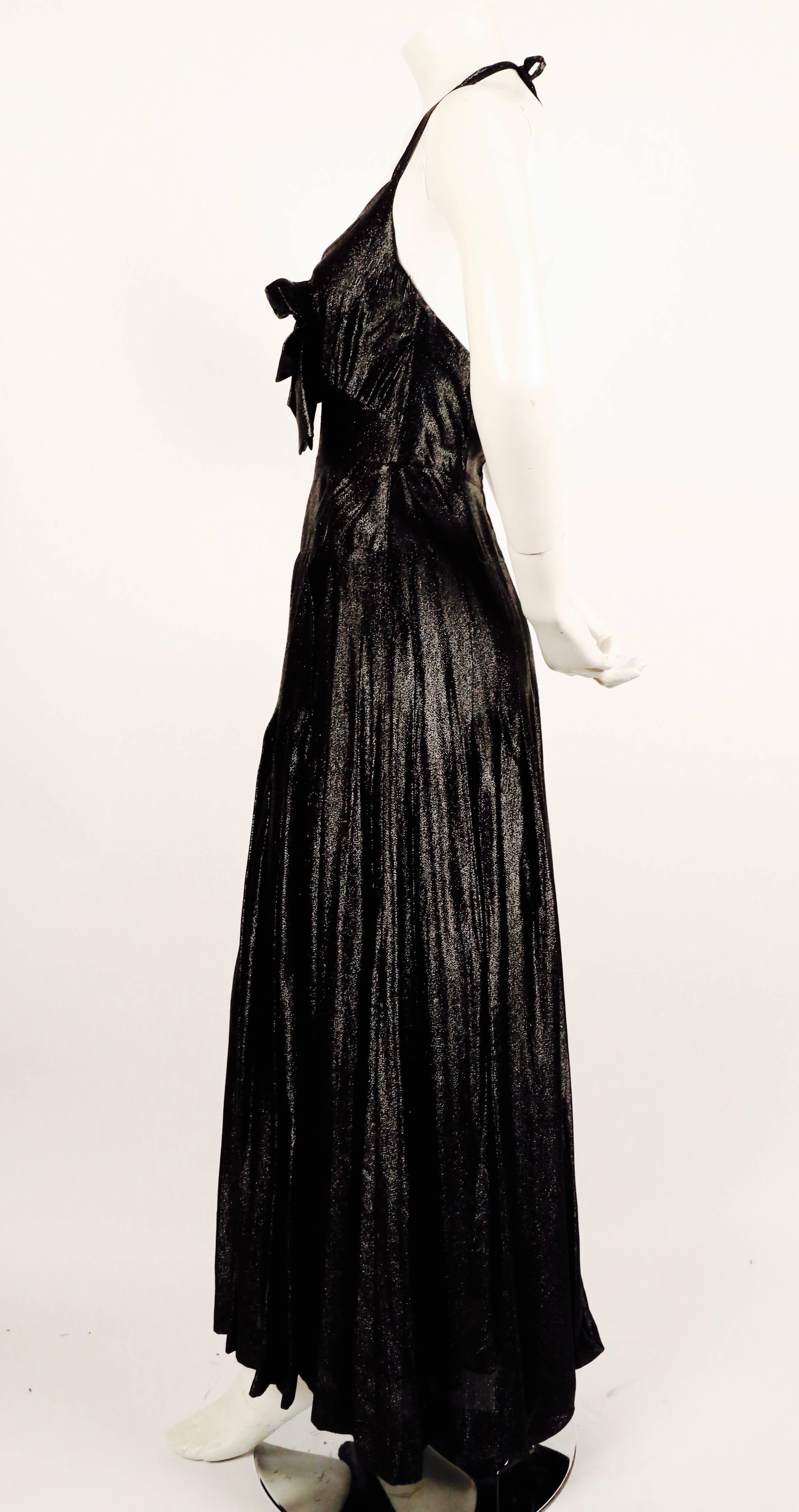 Black Chanel metallic black silk maxi gown with bow and keyhole, 1983 