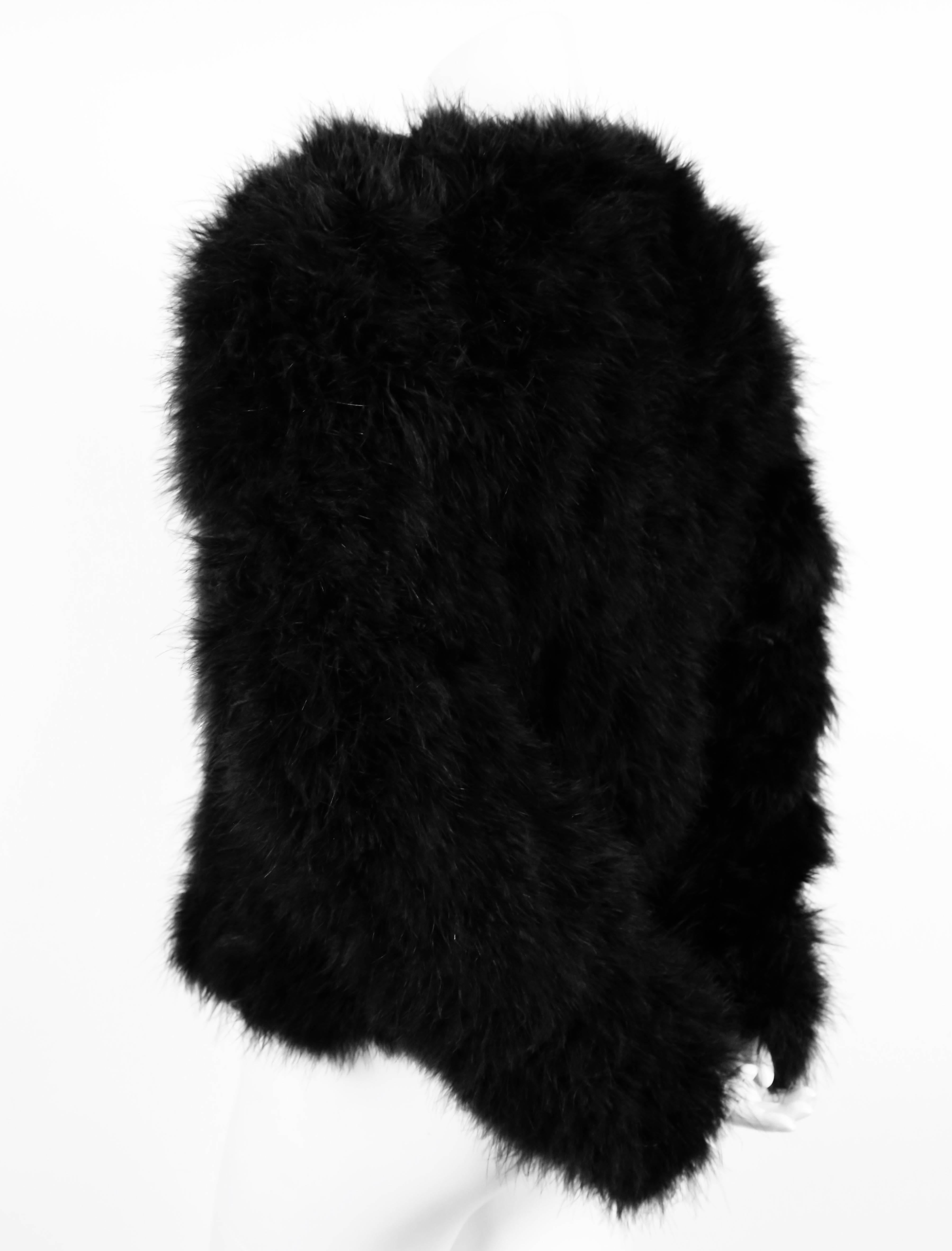 Black marabou chubby jacket by Sonia Rykiel dating to the late 1970's. Labeled a French size 38 although this piece also fits a French 36. Approximate measurements: 15